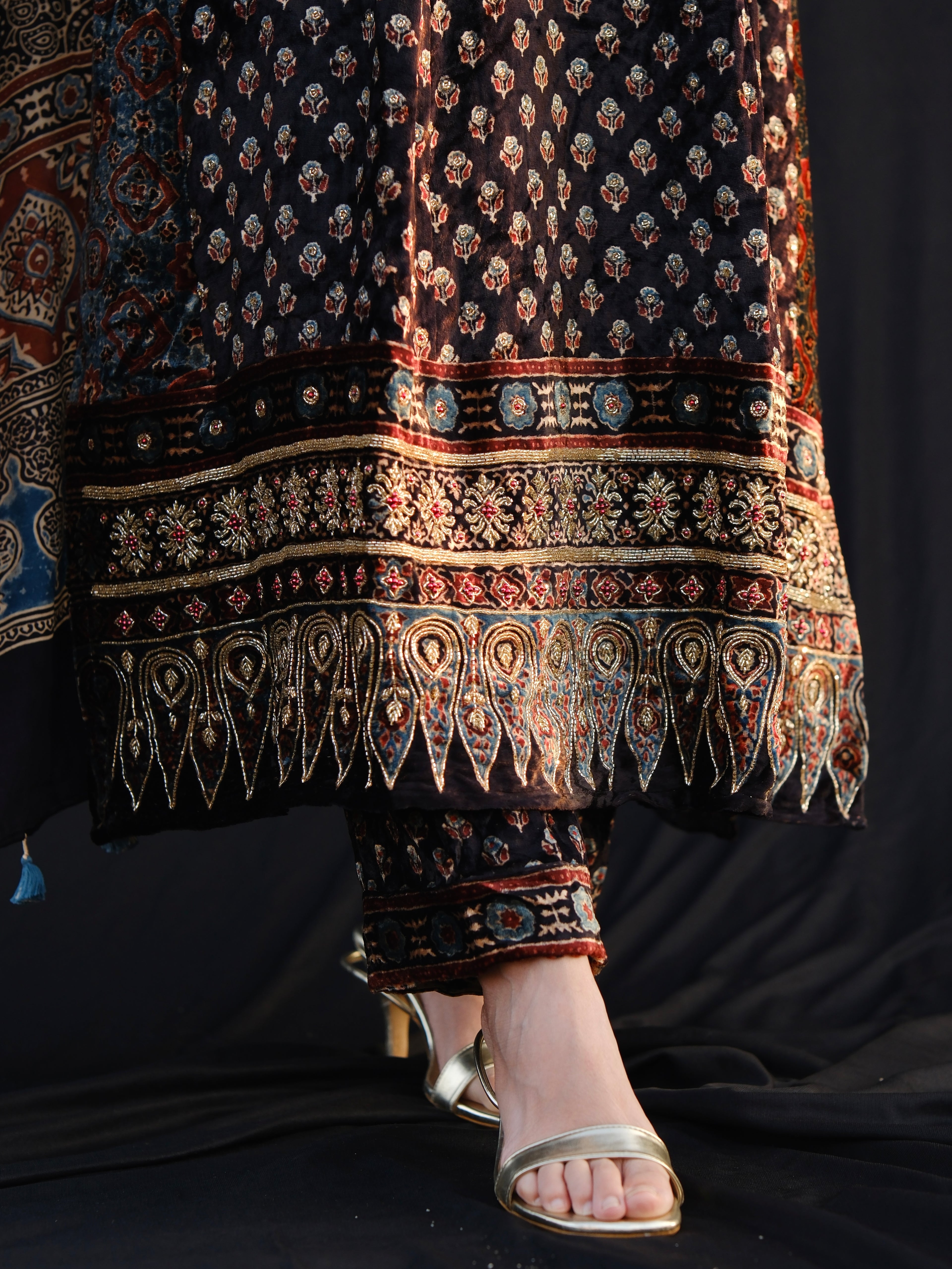 Ajrakh hand block printed velvet silk panel line salwar set with cutbead handwork