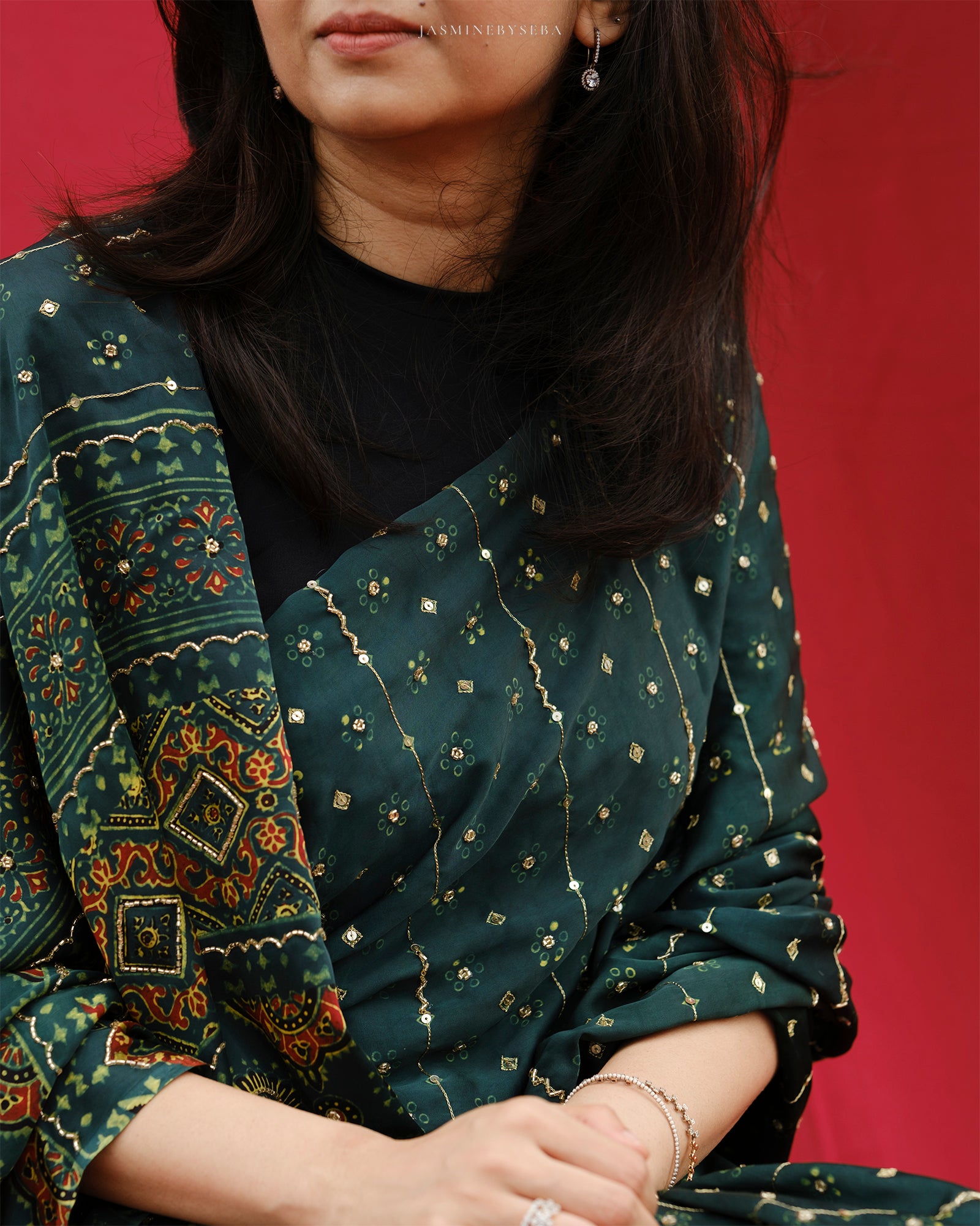 Ajrakh modal silk hand dyed, hand block printed and handworked saree