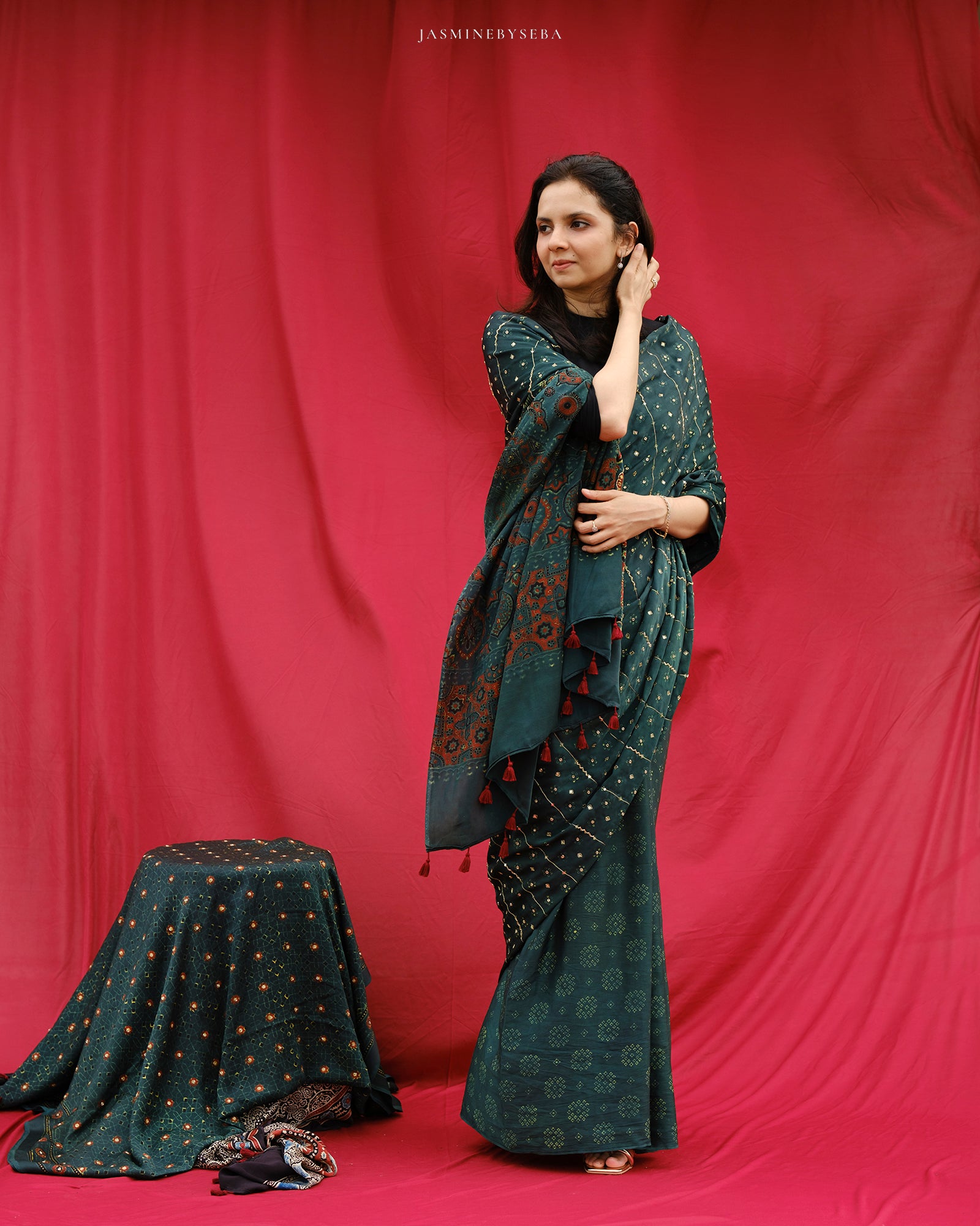 Ajrakh modal silk hand dyed, hand block printed and handworked saree