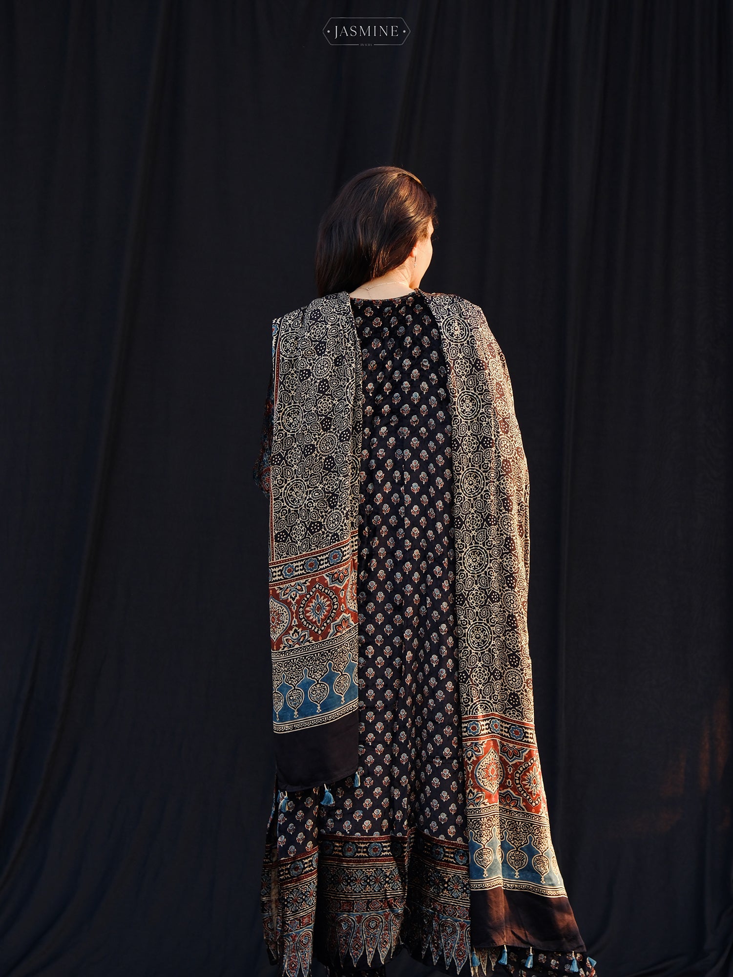 Ajrakh hand block printed velvet silk panel line salwar set with cutbead handwork