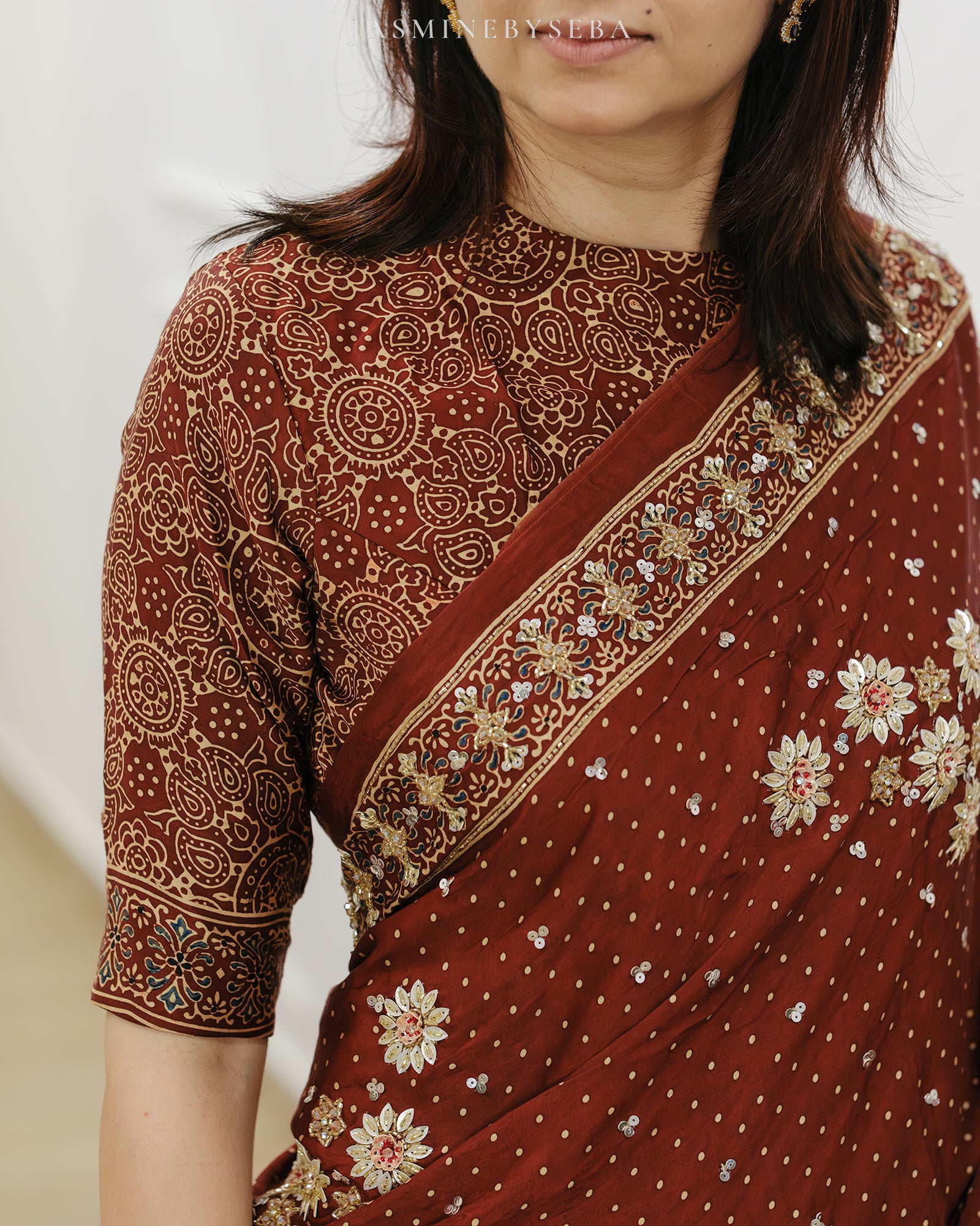 Ajrakh pure modal silk hand dyed, hand block printed and handworked saree