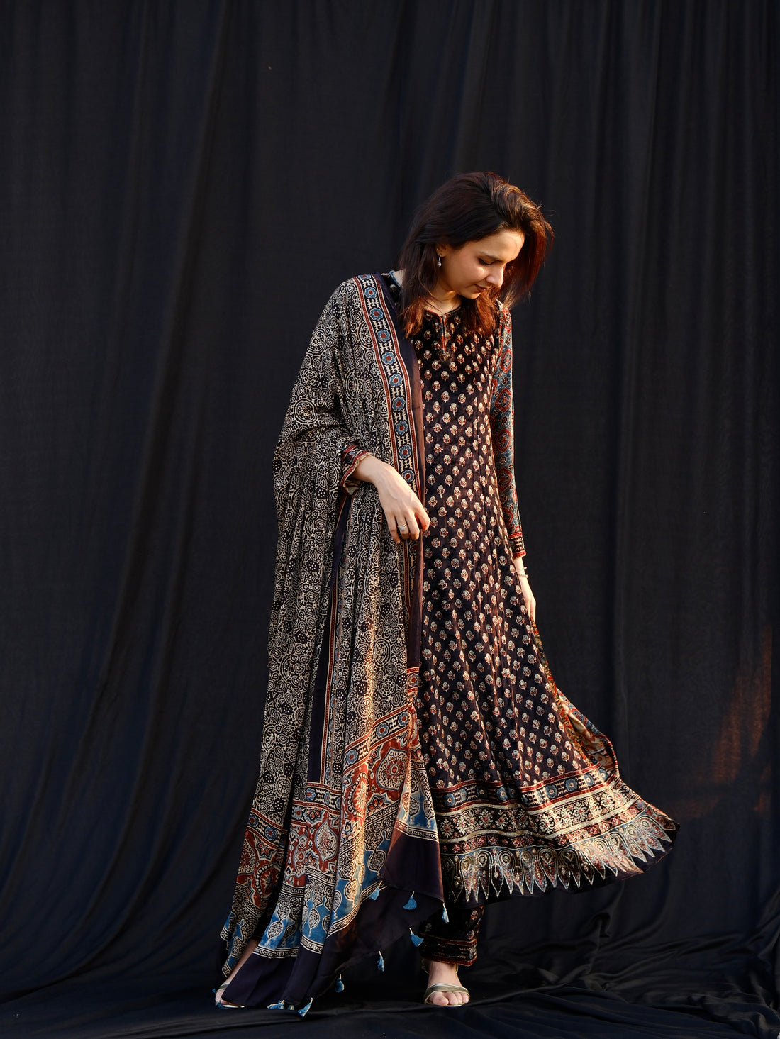 Ajrakh hand block printed velvet silk panel line salwar set with cutbead handwork