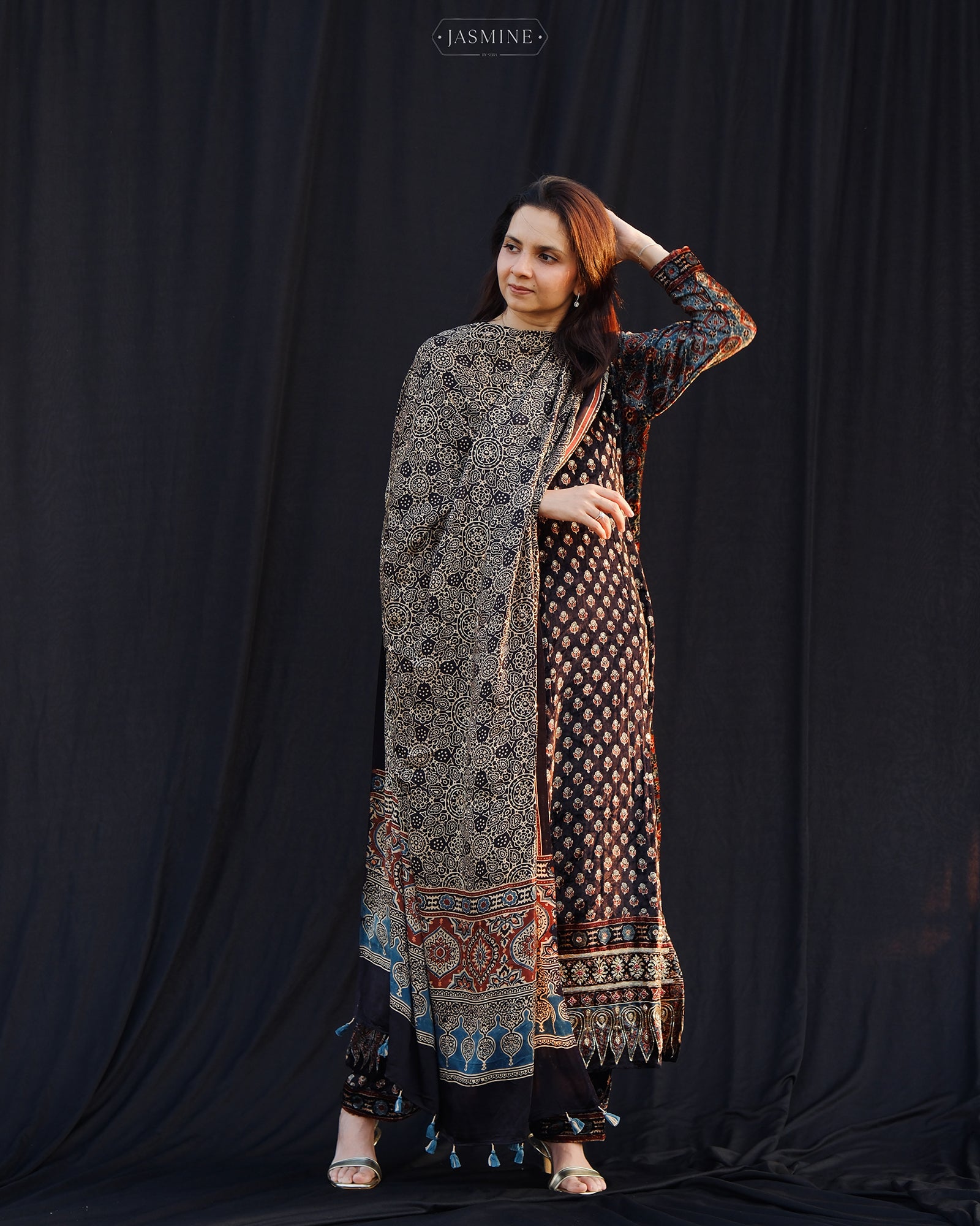 Ajrakh hand block printed velvet silk panel line salwar set with cutbead handwork