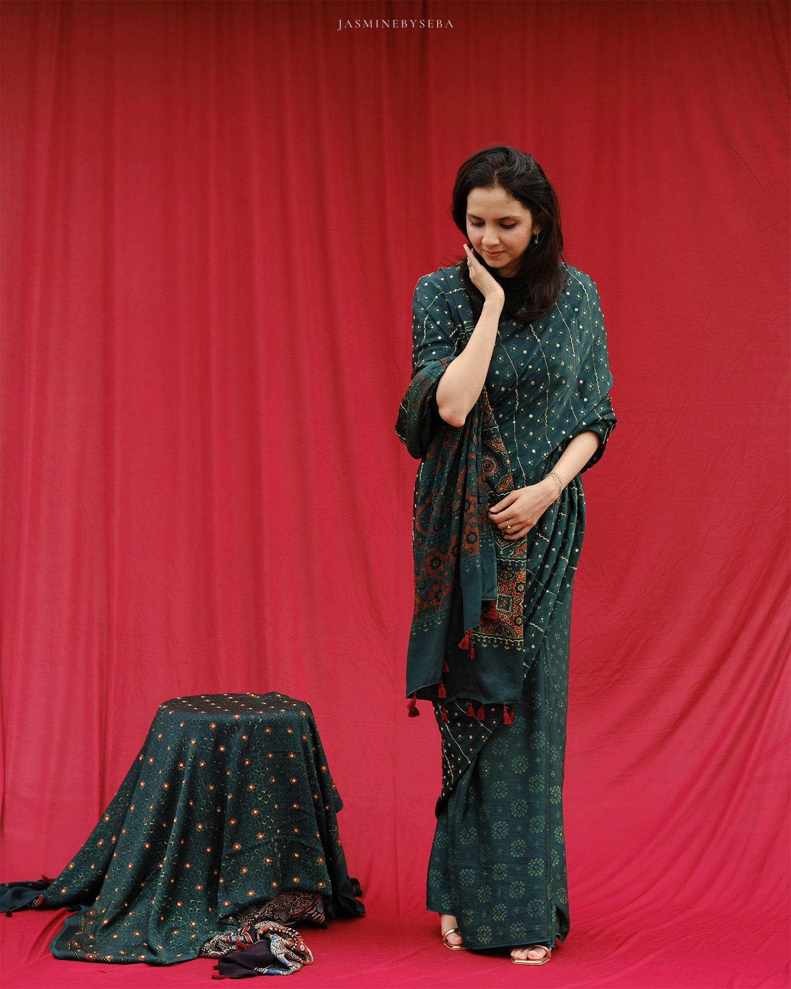 Ajrakh modal silk hand dyed, hand block printed and handworked saree