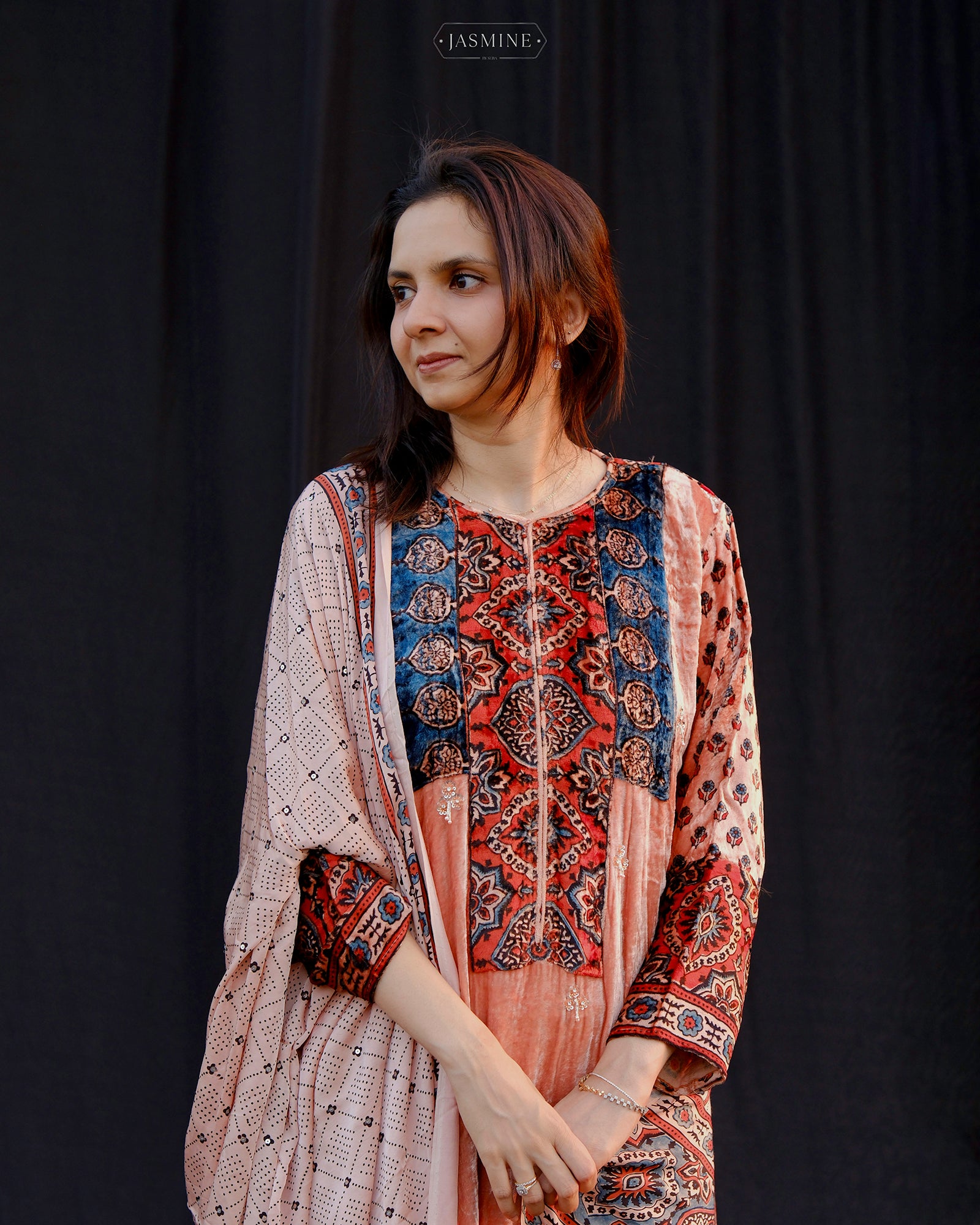 Ajrakh hand block printed velvet silk panel line salwar set with cutbead handwork