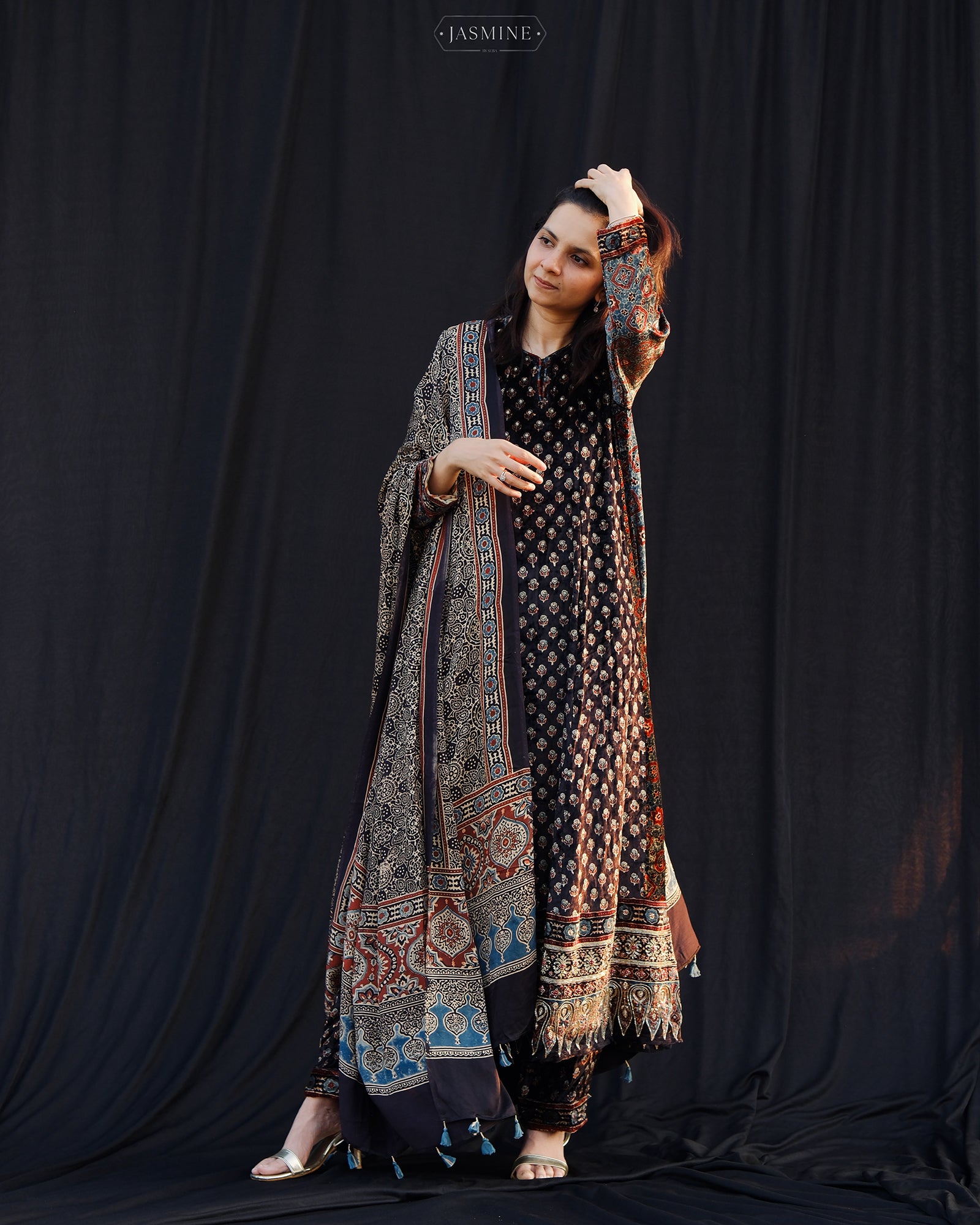 Ajrakh hand block printed velvet silk panel line salwar set with cutbead handwork