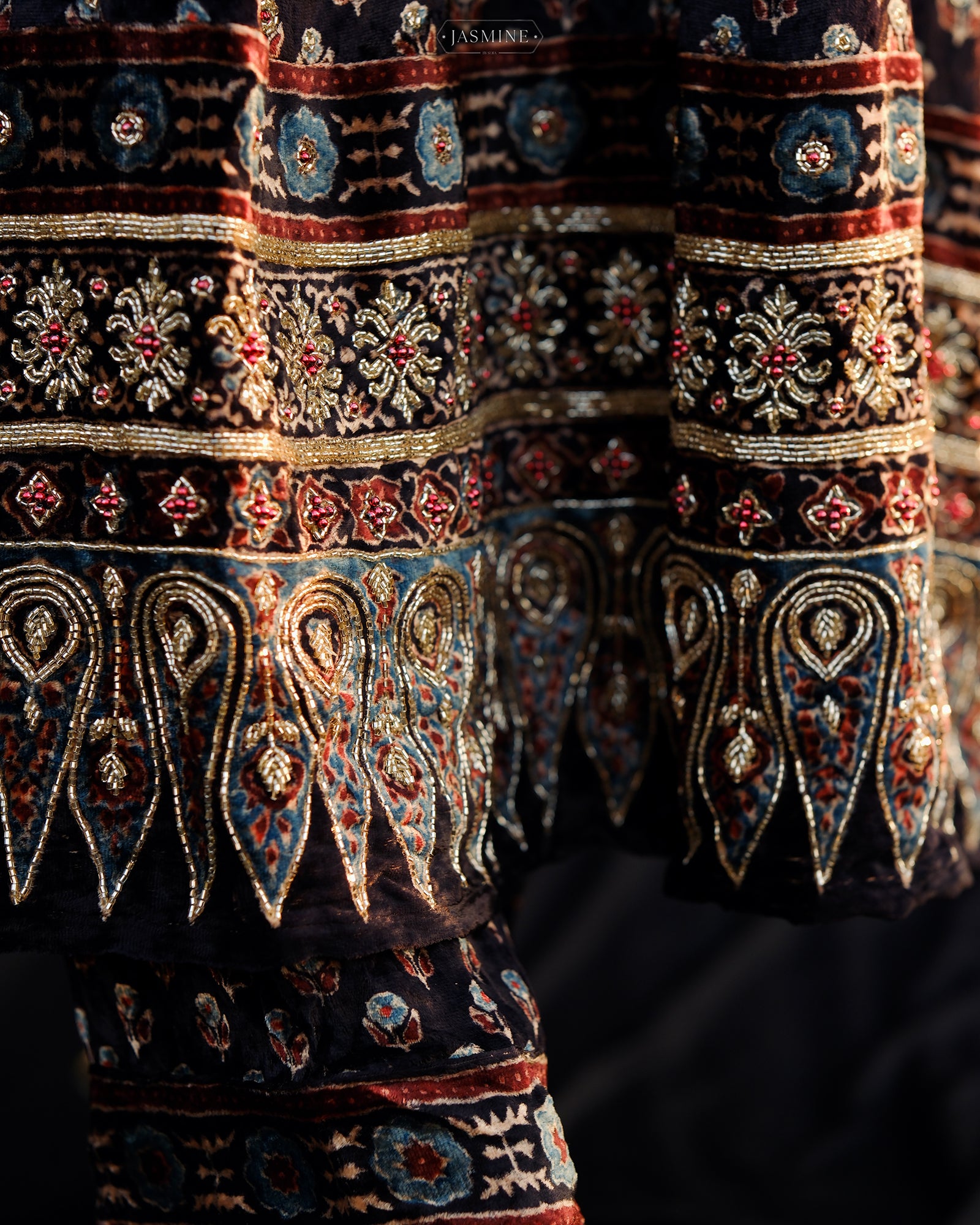 Ajrakh hand block printed velvet silk panel line salwar set with cutbead handwork