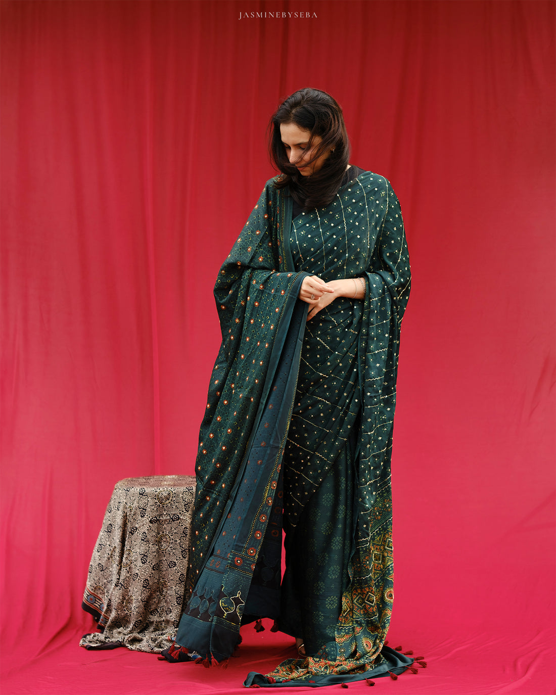 Ajrakh modal silk hand dyed, hand block printed and handworked saree