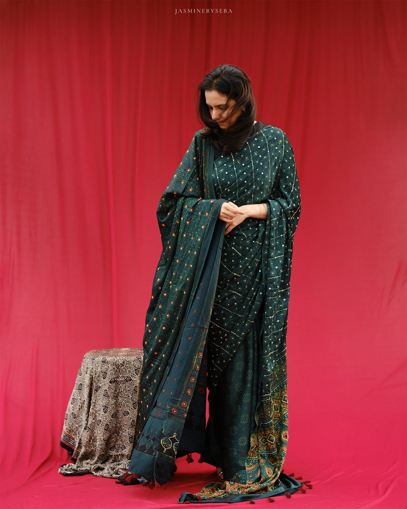 Ajrakh modal silk hand dyed, hand block printed and handworked saree
