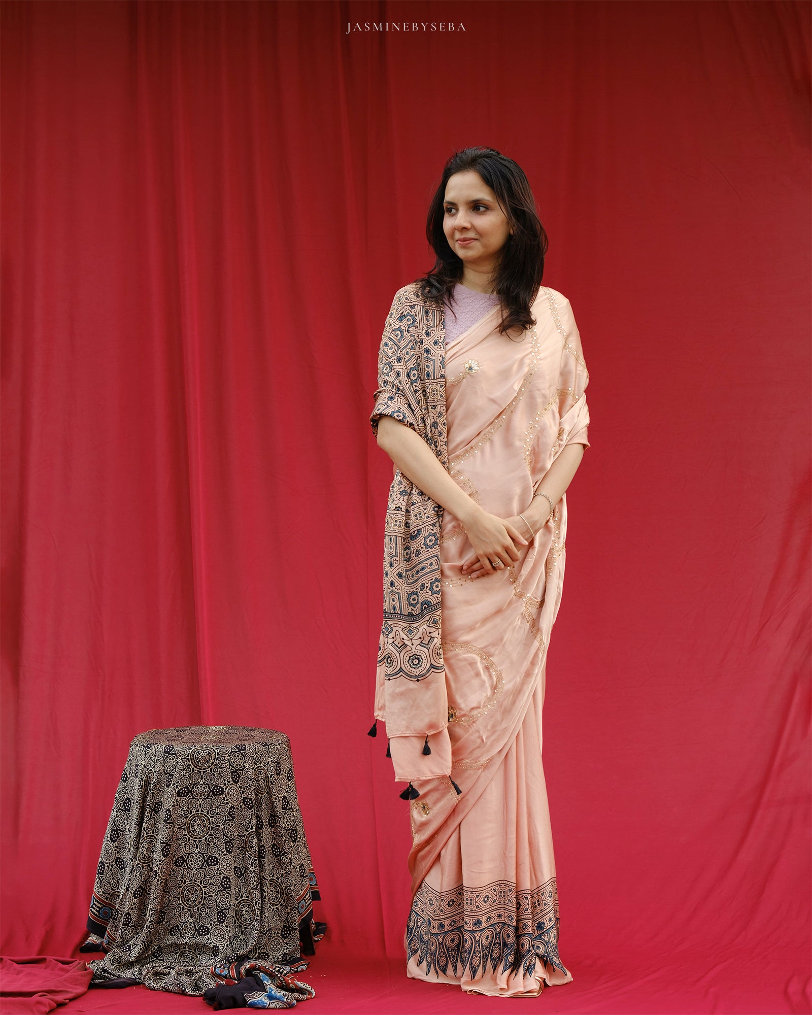 Ajrakh modal silk hand dyed, hand block printed and handworked saree