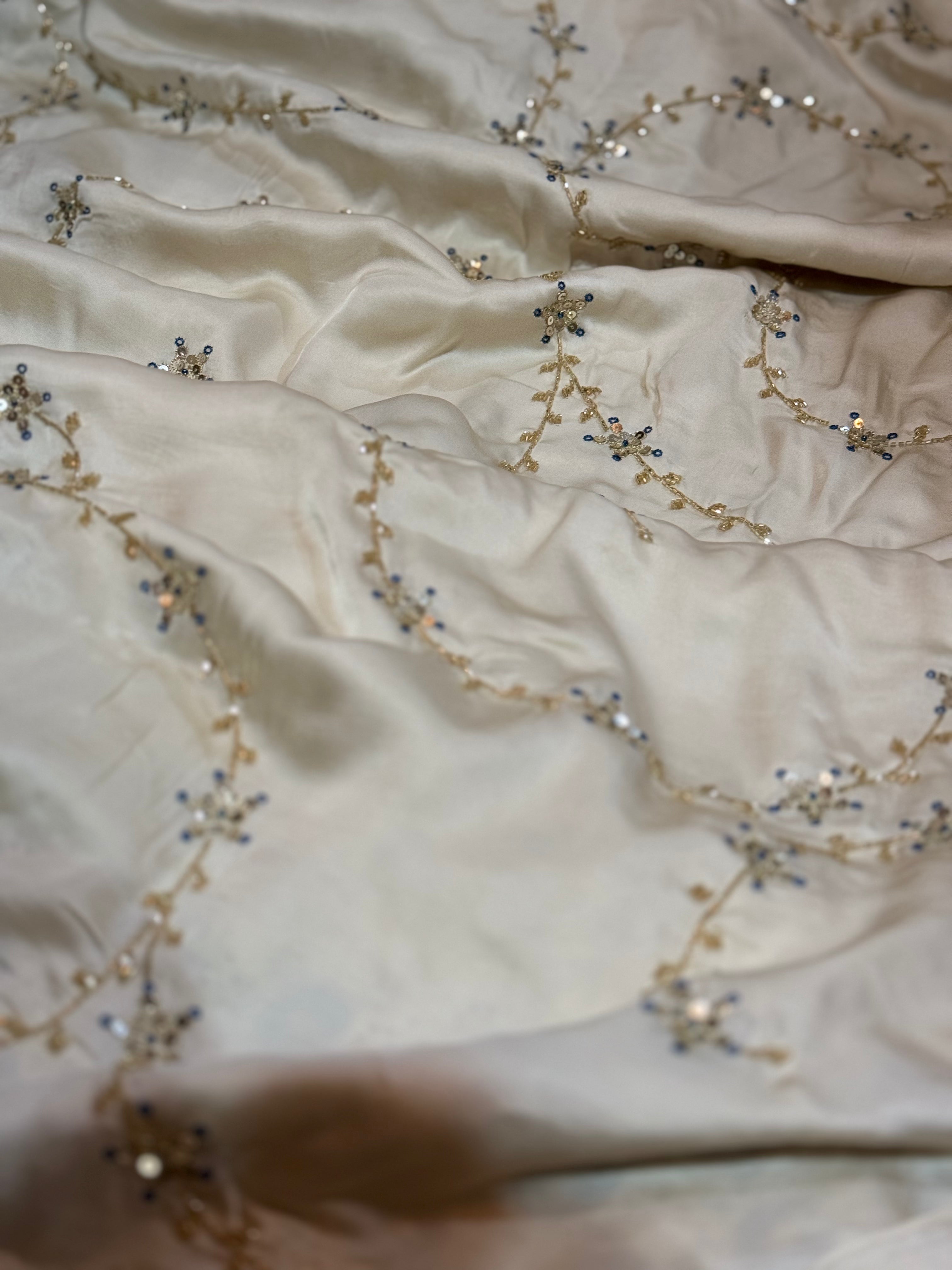 Ajrakh modal silk hand dyed, hand block printed and handworked saree