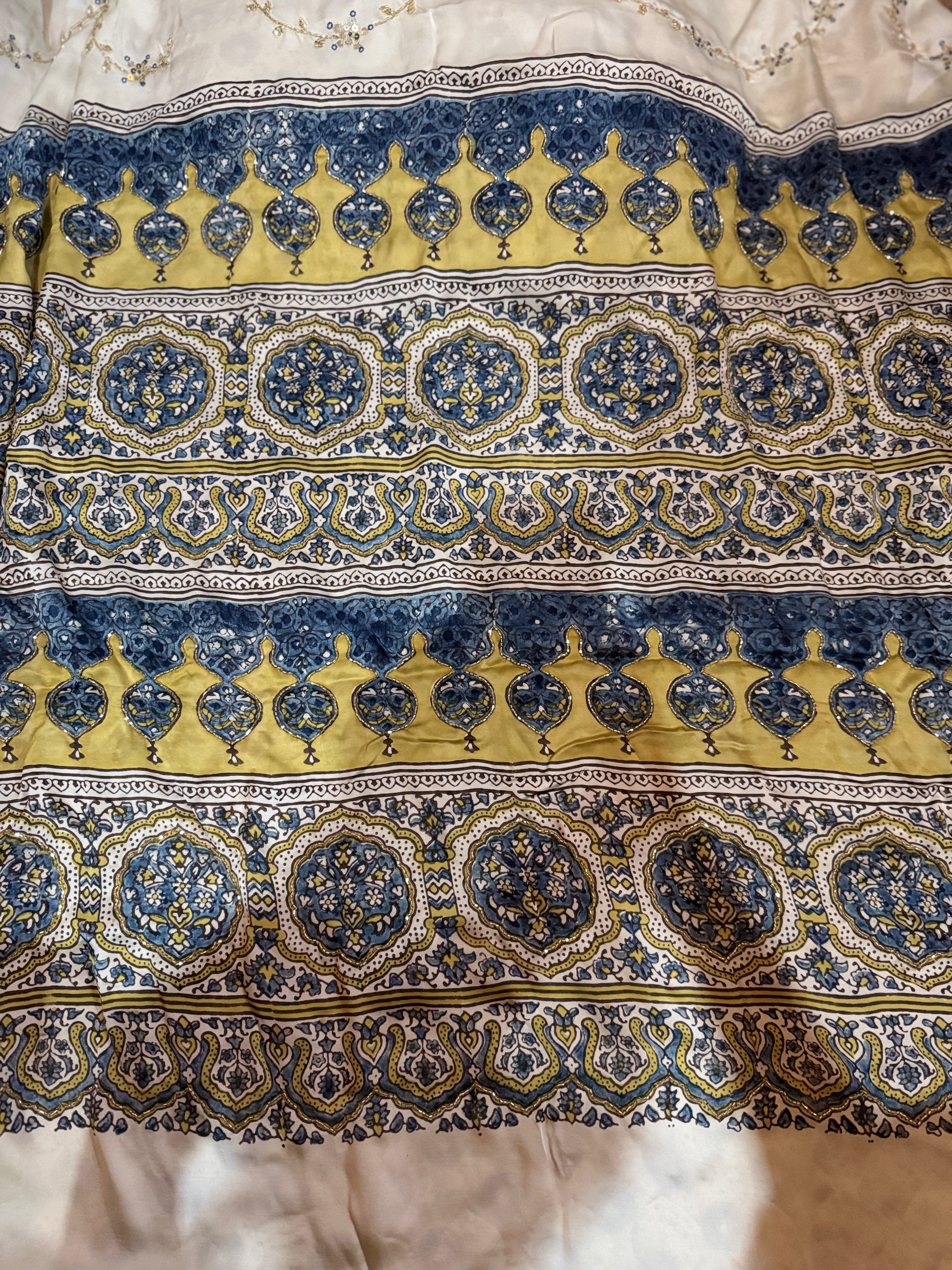 Ajrakh modal silk hand dyed, hand block printed and handworked saree