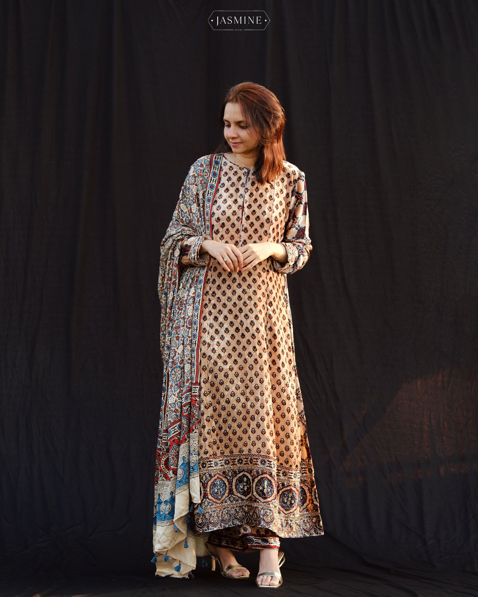 Ajrakh hand block printed velvet silk panel line salwar set with cutbead handwork