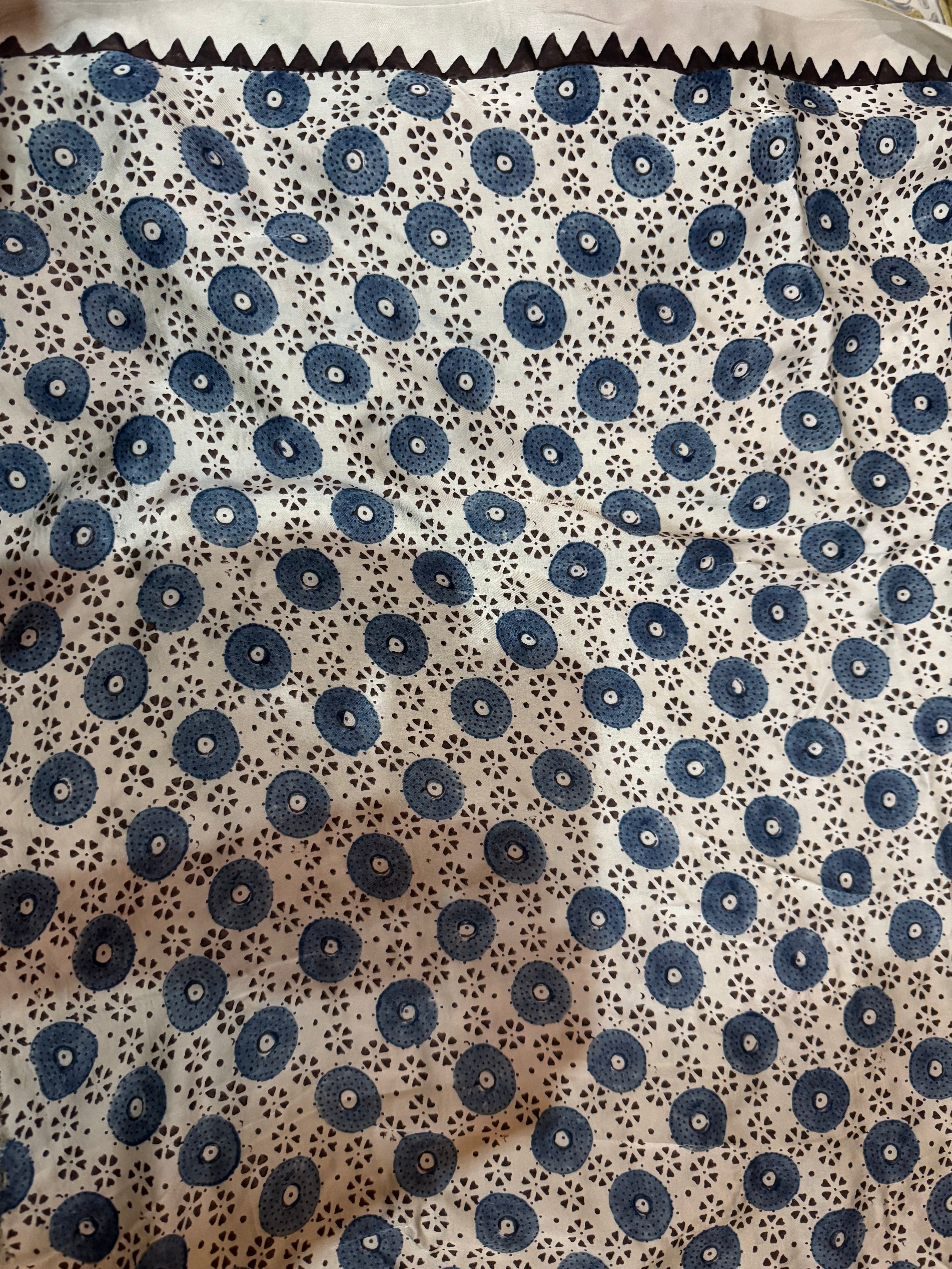 Ajrakh modal silk hand dyed, hand block printed and handworked saree