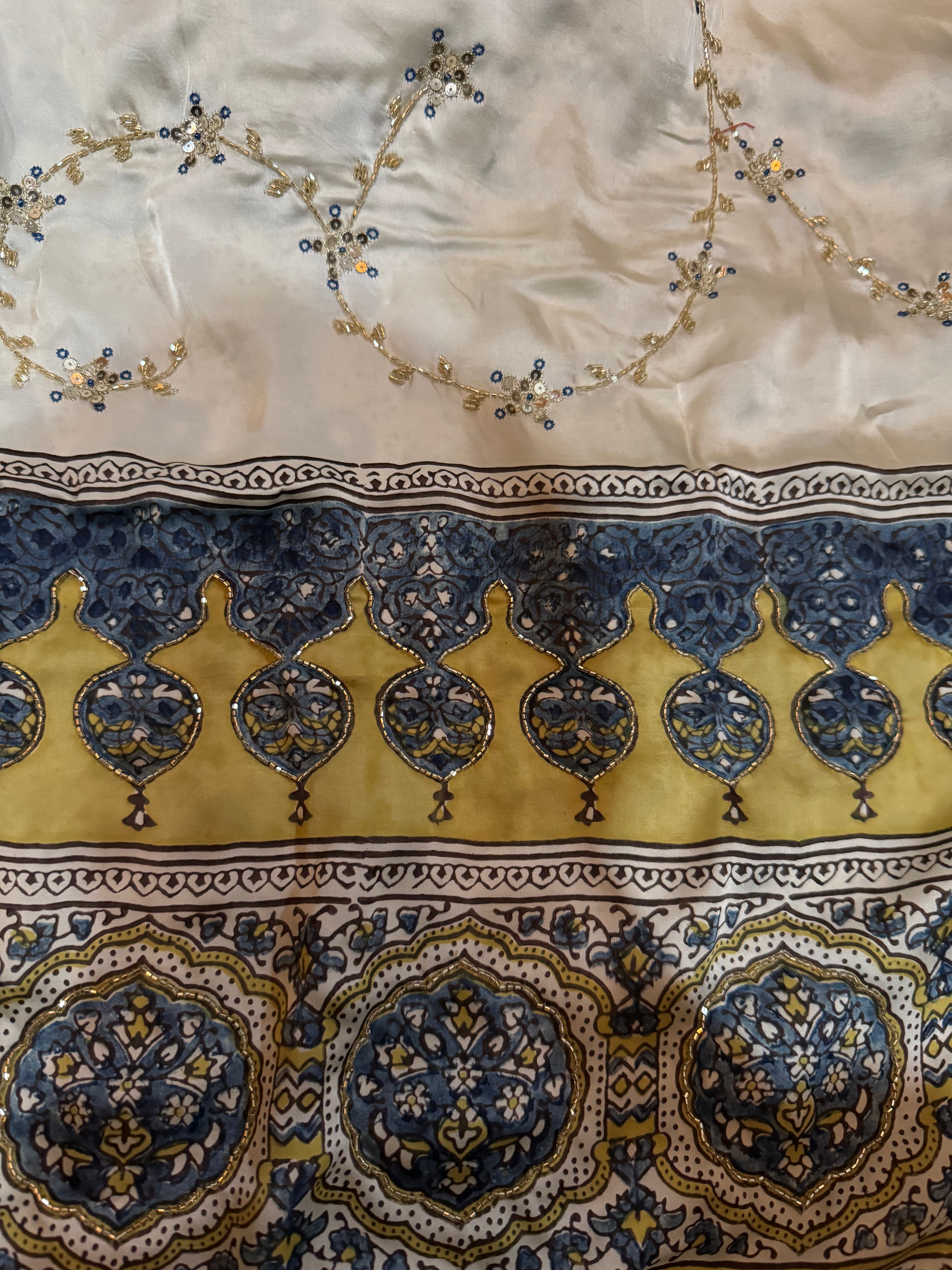 Ajrakh modal silk hand dyed, hand block printed and handworked saree