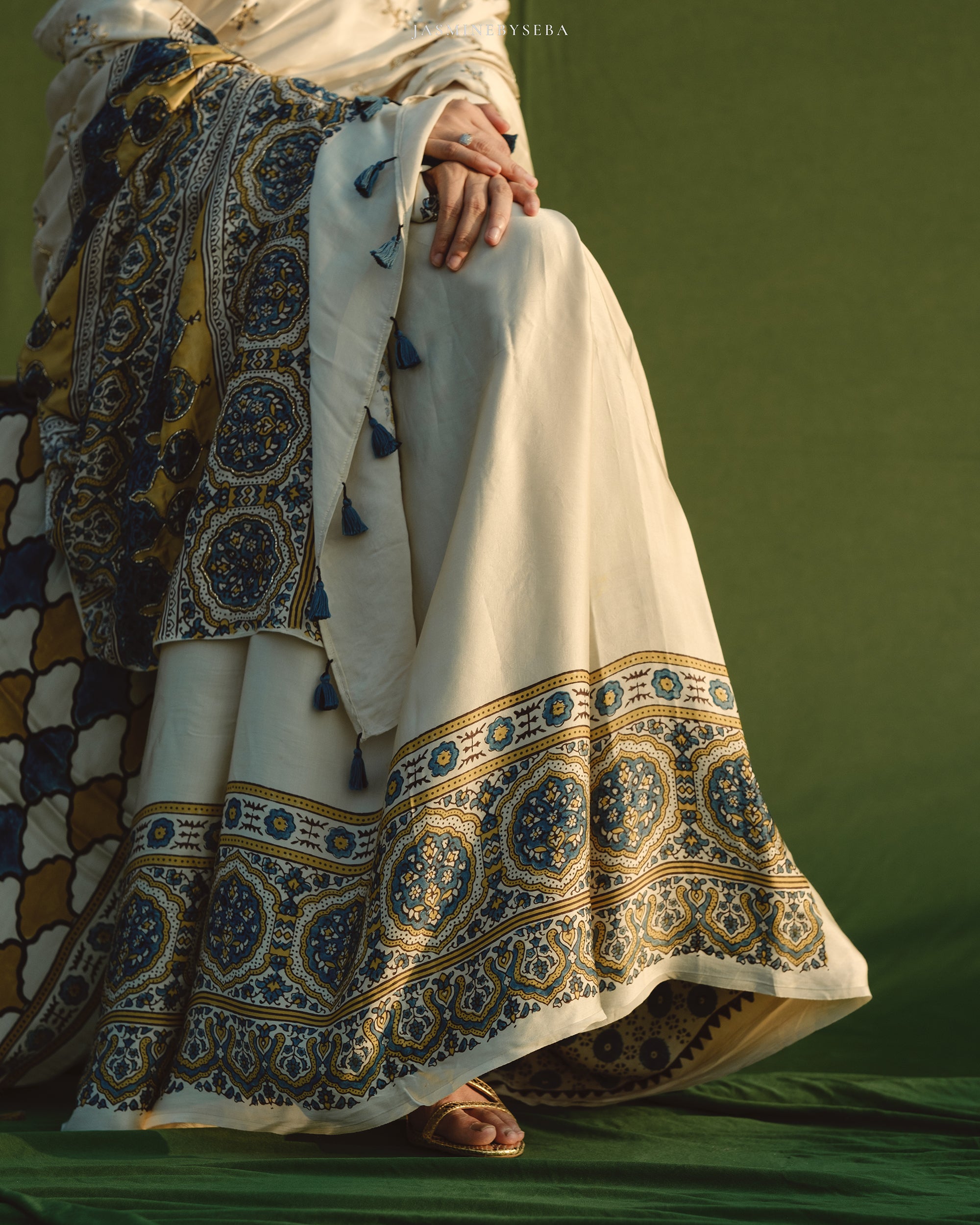 Ajrakh modal silk hand dyed, hand block printed and handworked saree