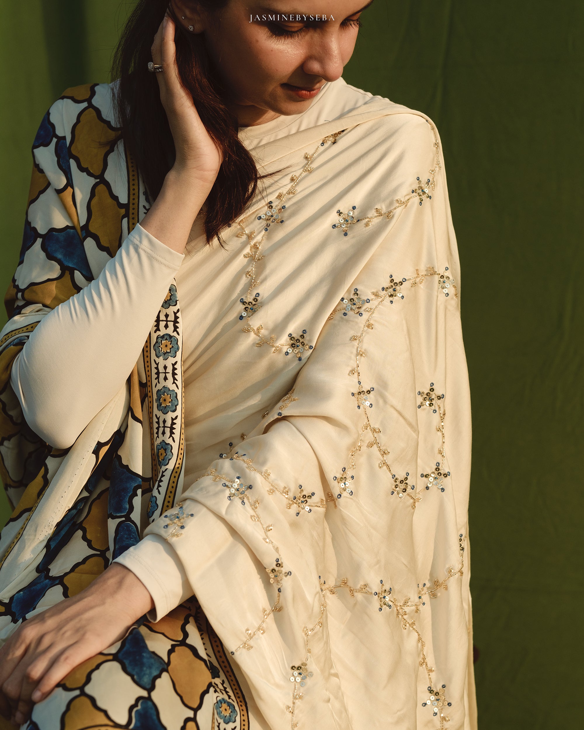 Ajrakh modal silk hand dyed, hand block printed and handworked saree