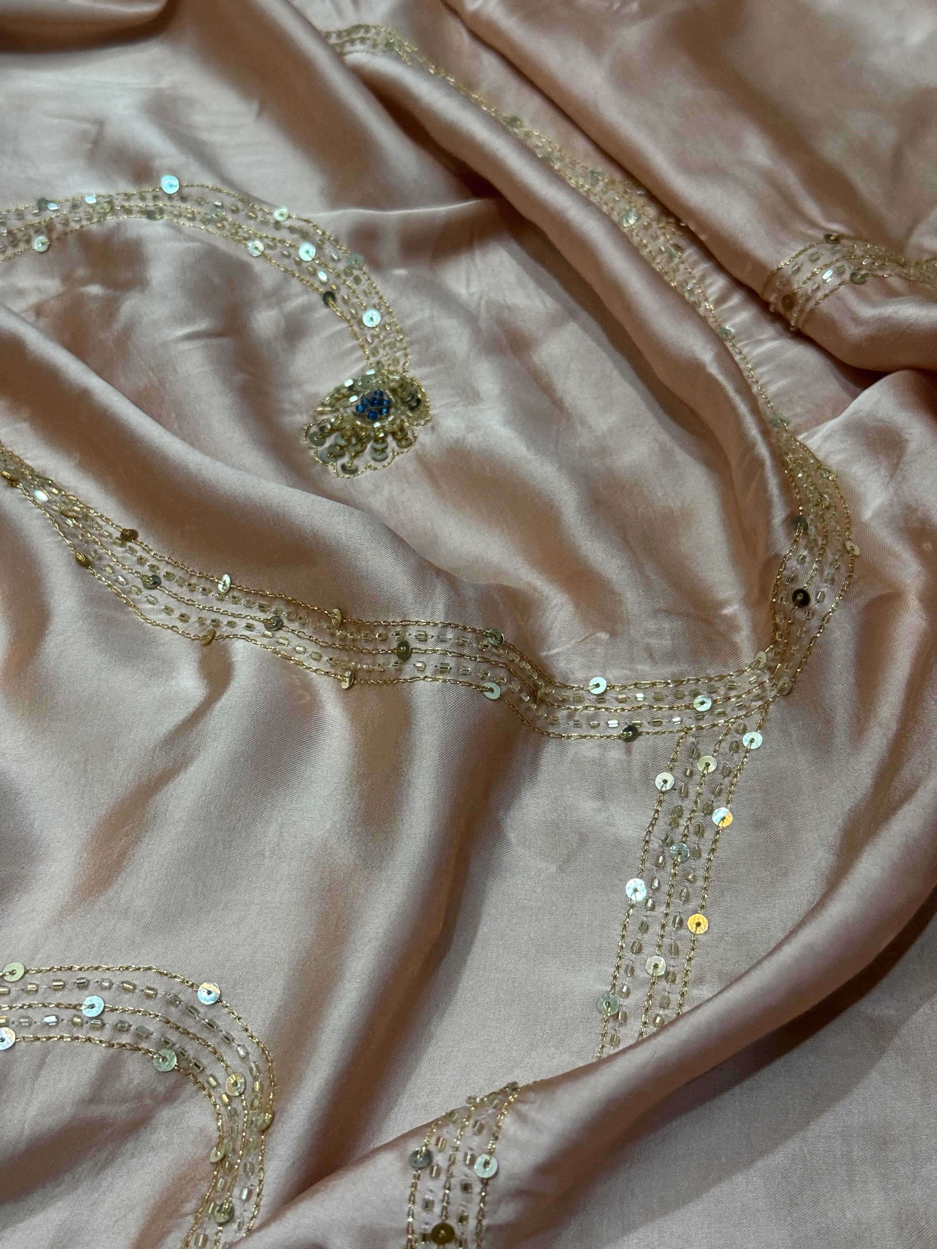 Ajrakh modal silk hand dyed, hand block printed and handworked saree