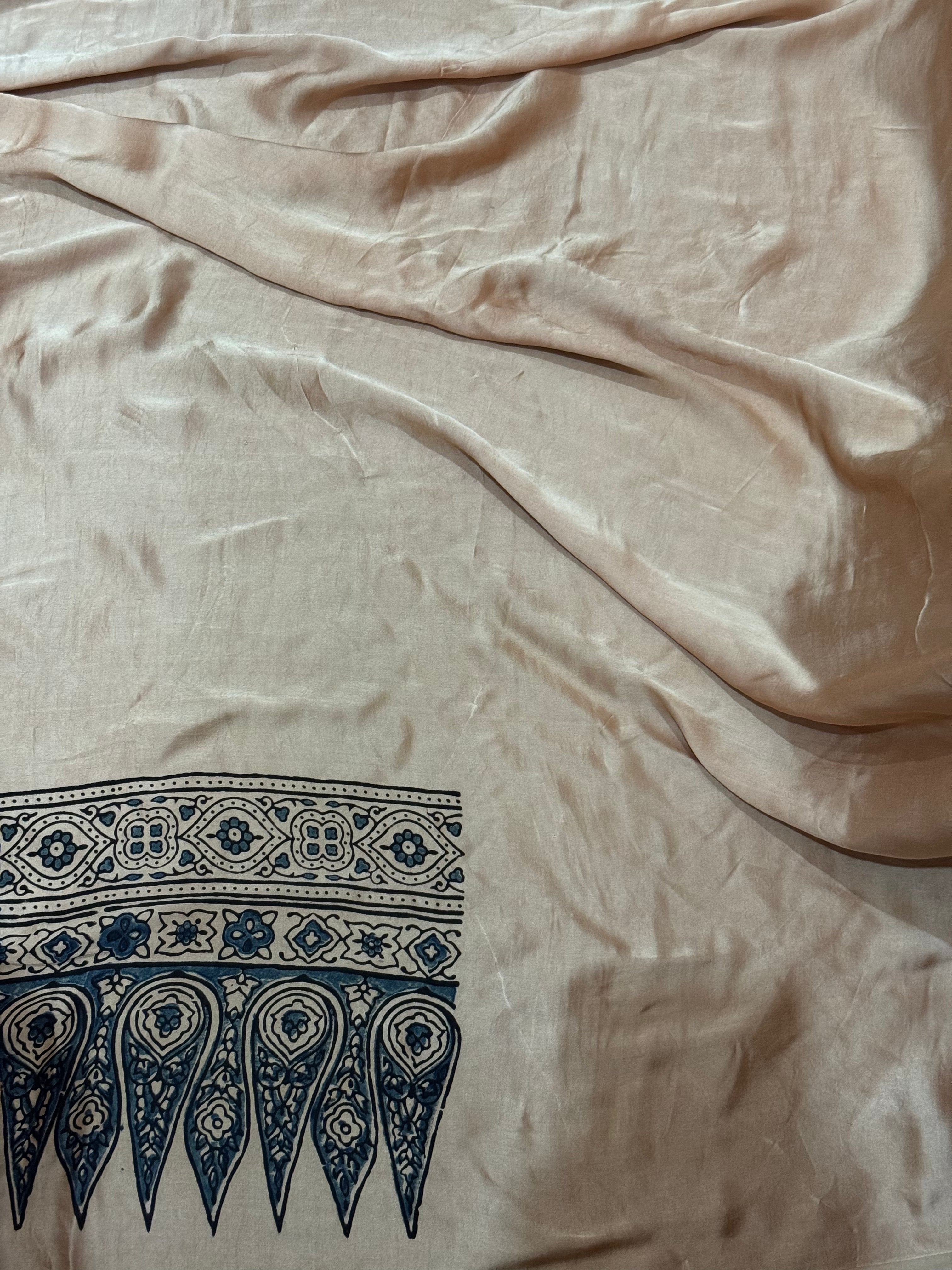 Ajrakh modal silk hand dyed, hand block printed and handworked saree