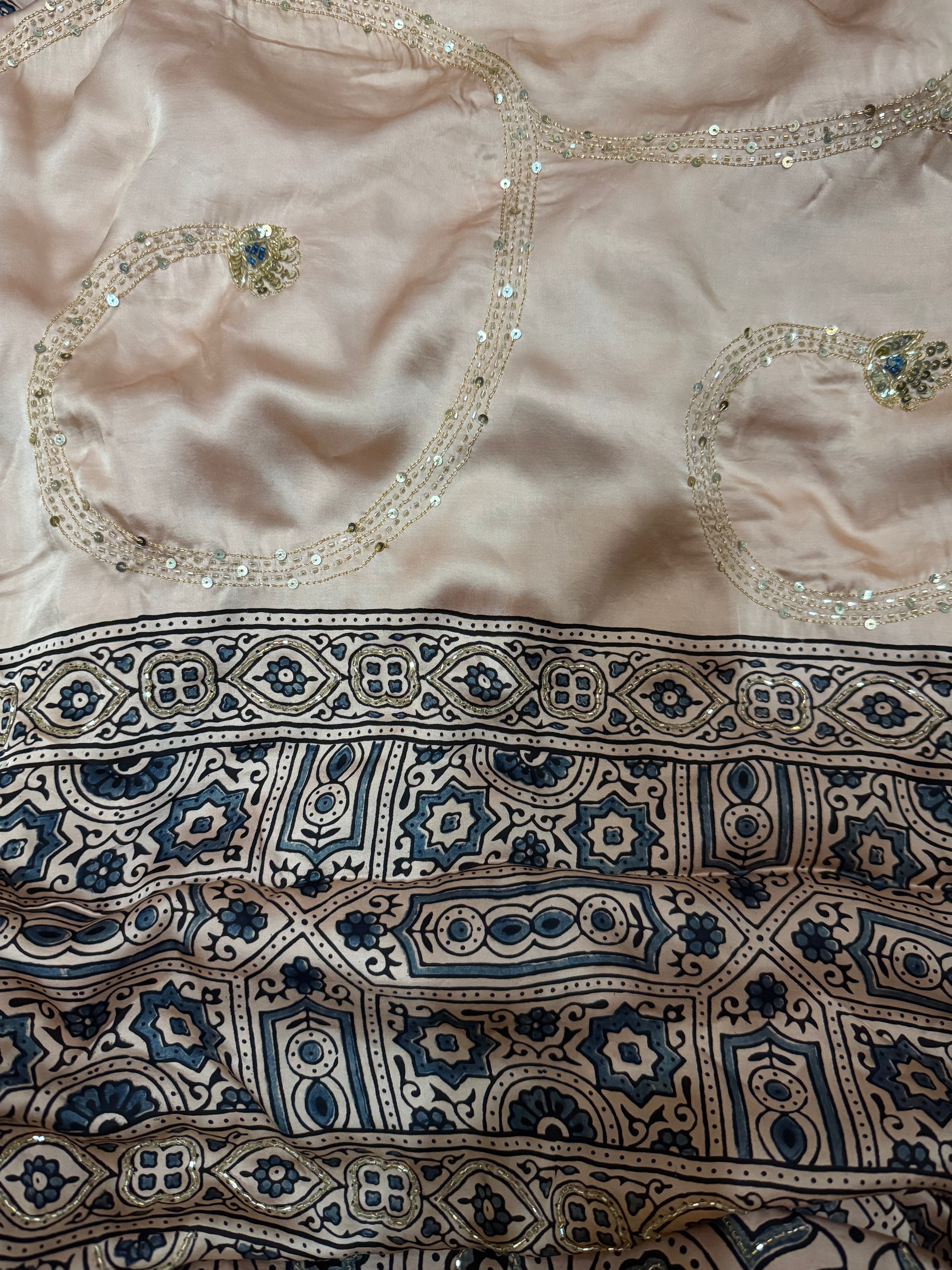 Ajrakh modal silk hand dyed, hand block printed and handworked saree