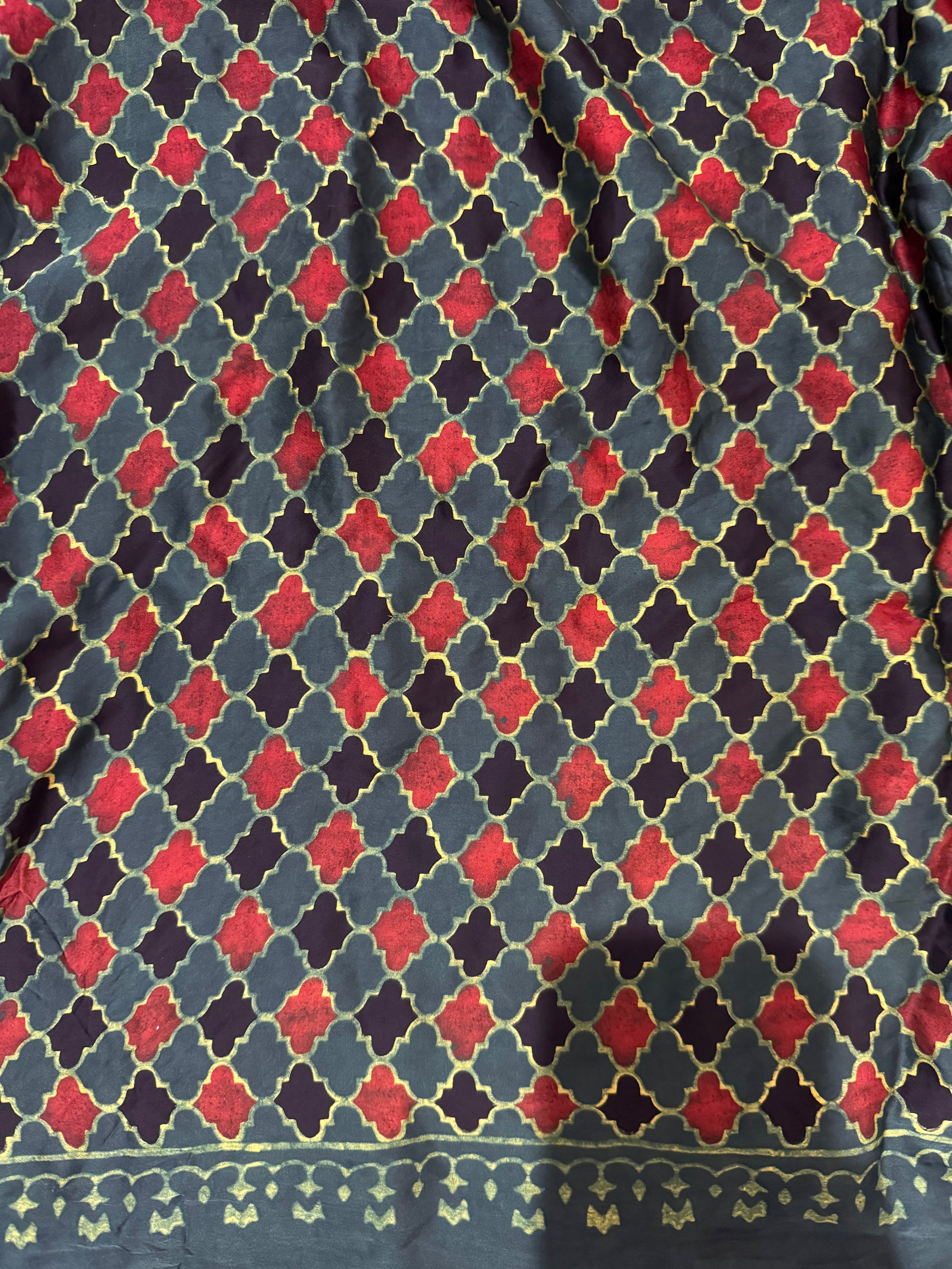 Ajrakh modal silk hand dyed, hand block printed and handworked saree