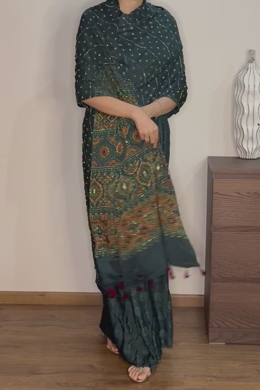 Ajrakh modal silk hand dyed, hand block printed and handworked saree