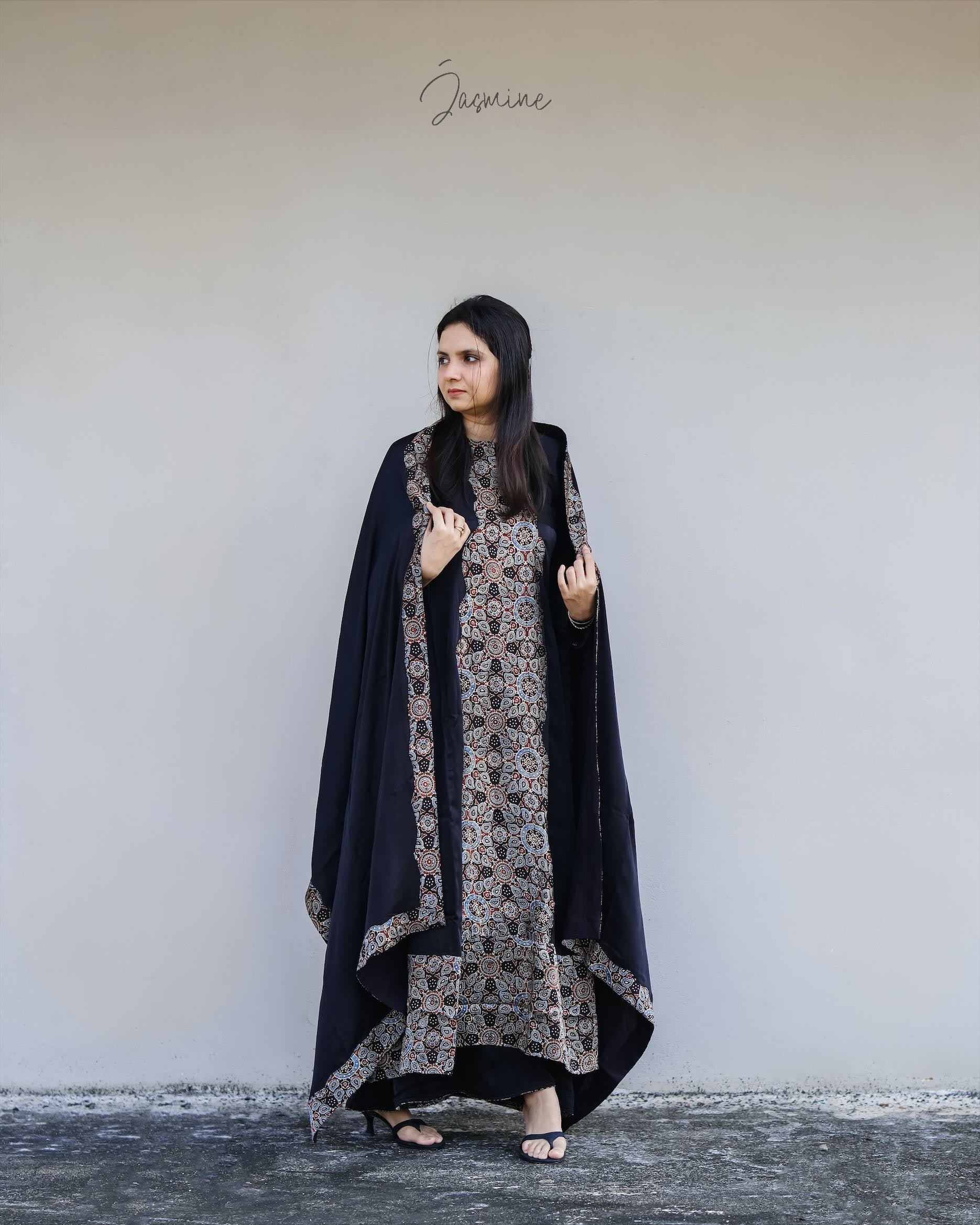 Ajrakh modal silk panel cut dress with printed modal silk patchwork teamed with
panel cut wide pants.