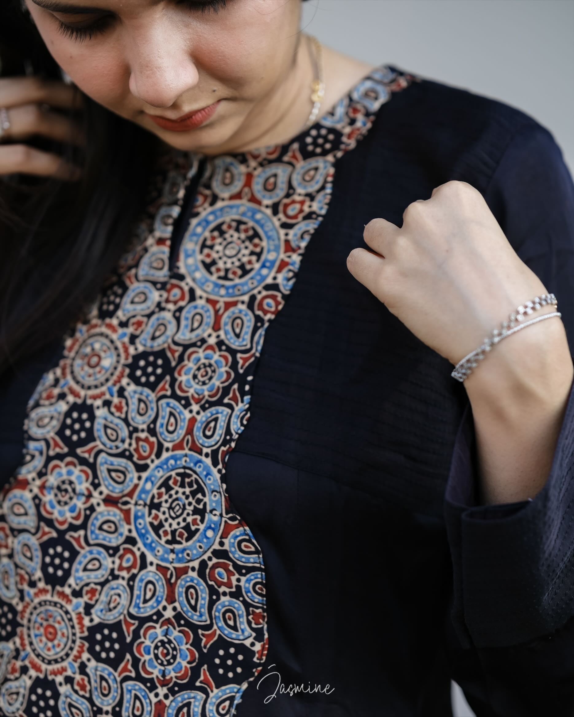 Ajrakh modal silk panel cut dress with printed modal silk patchwork teamed with
panel cut wide pants.