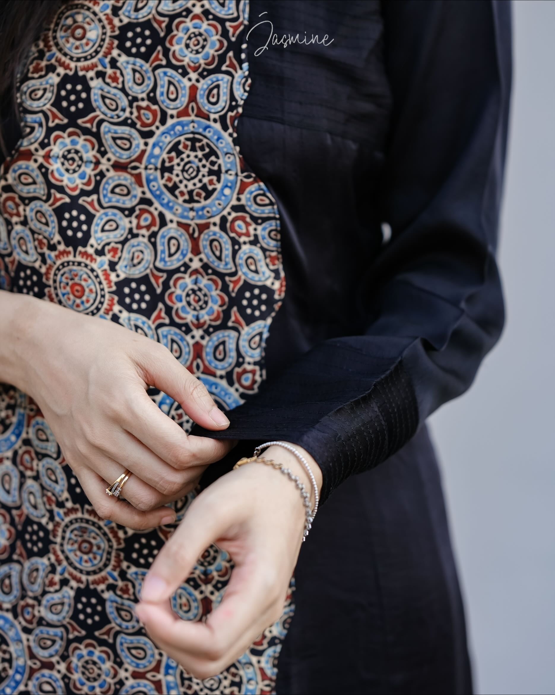 Ajrakh modal silk panel cut dress with printed modal silk patchwork teamed with
panel cut wide pants.