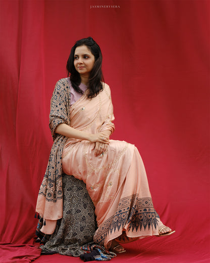 Ajrakh modal silk hand dyed, hand block printed and handworked saree