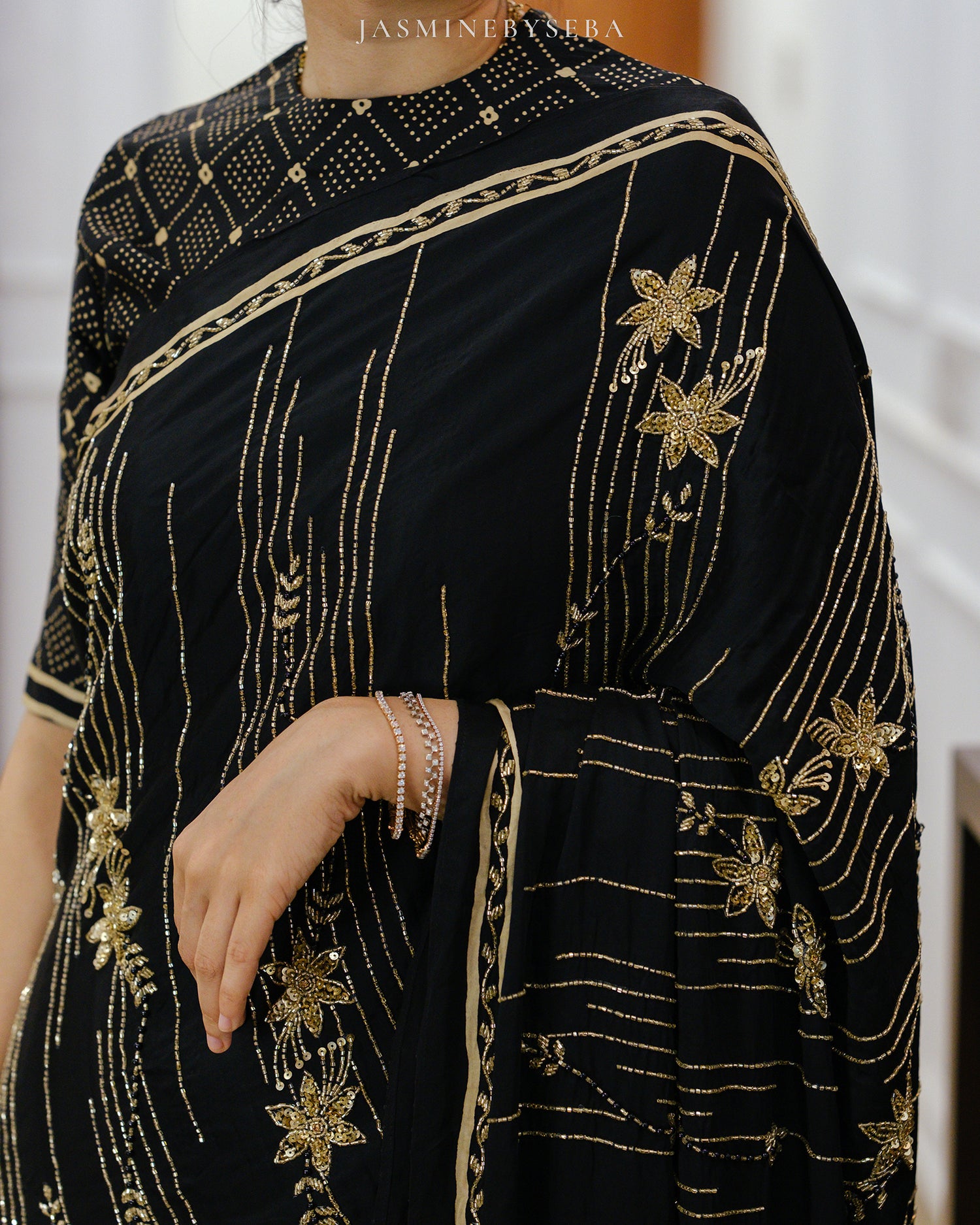 Ajrakh pure modal silk hand dyed, hand block printed and handworked saree