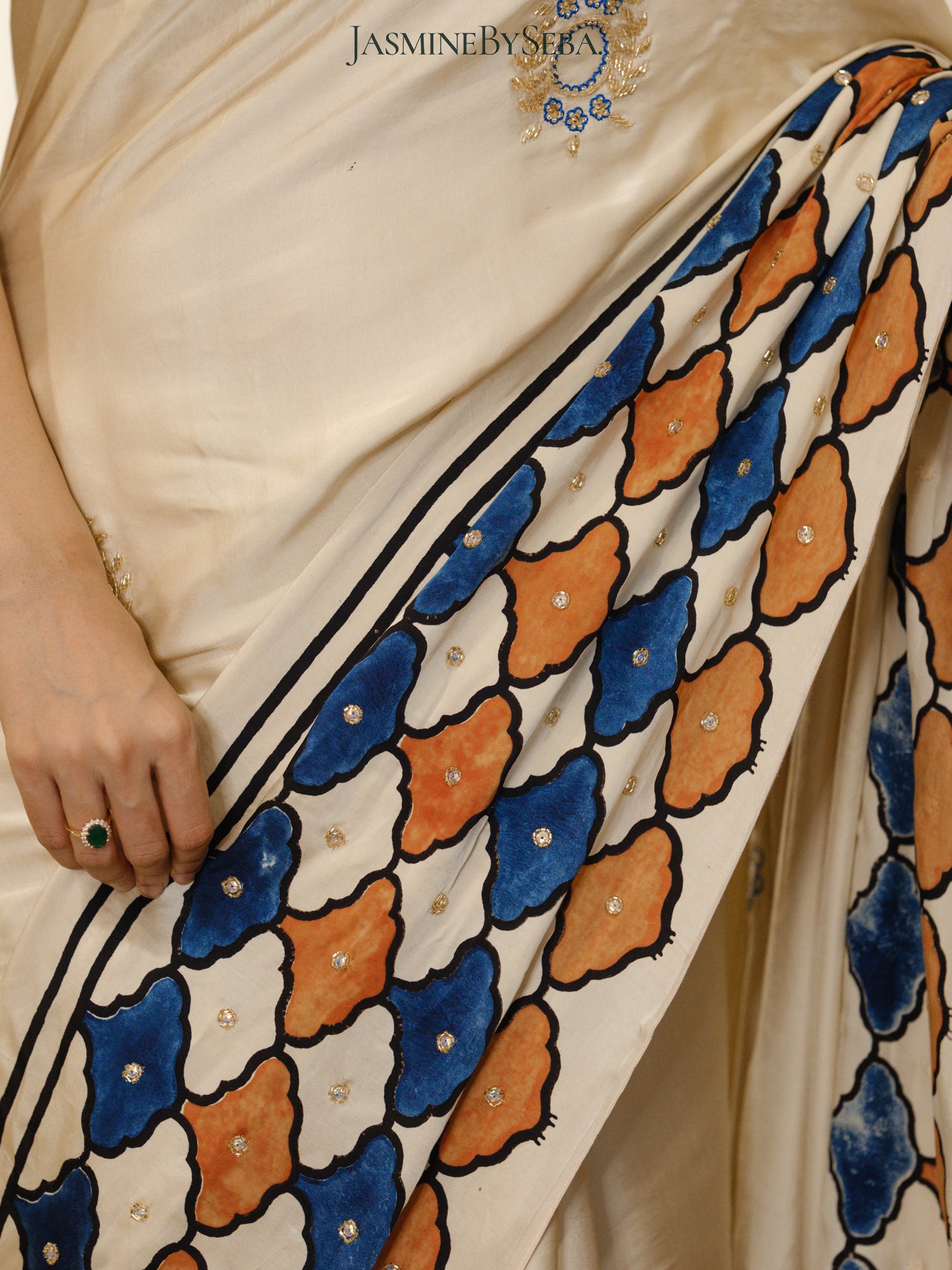 Bespoke ‘Jasmine’ hand printed 
Ajrakh pure modal silk hand dyed, hand block printed and handworked saree