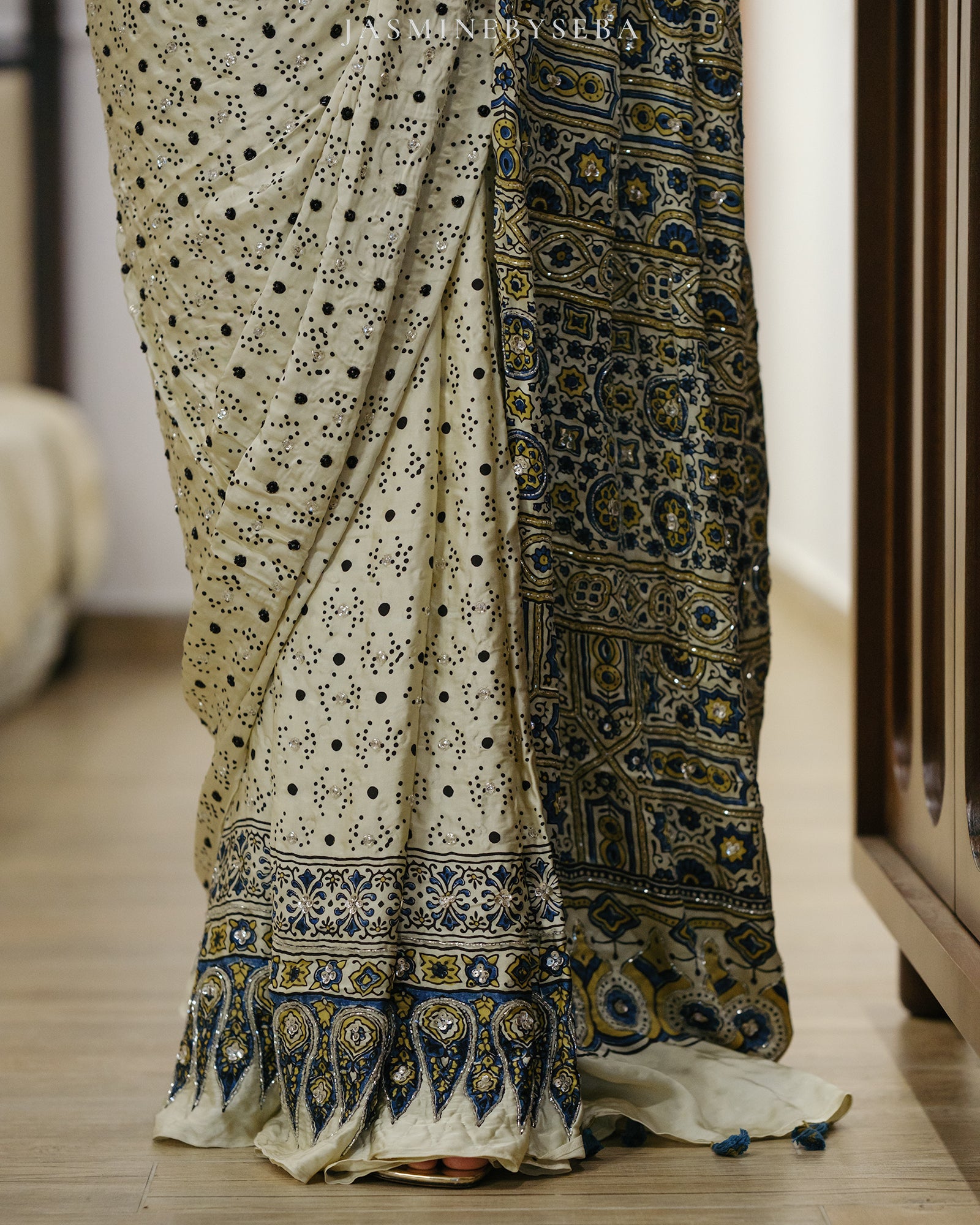 Ajrakh pure modal silk hand dyed, hand block printed and handworked saree