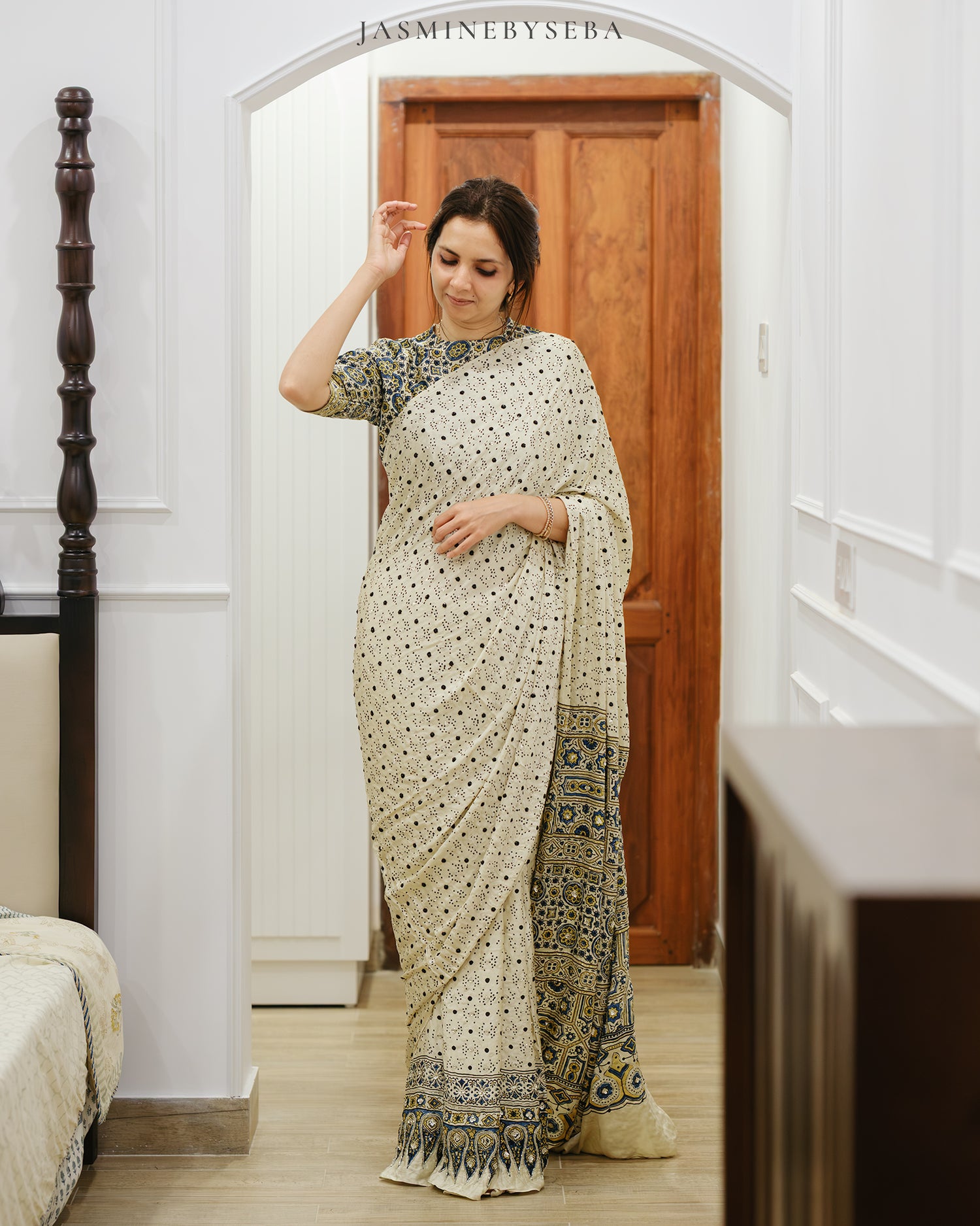 Ajrakh pure modal silk hand dyed, hand block printed and handworked saree