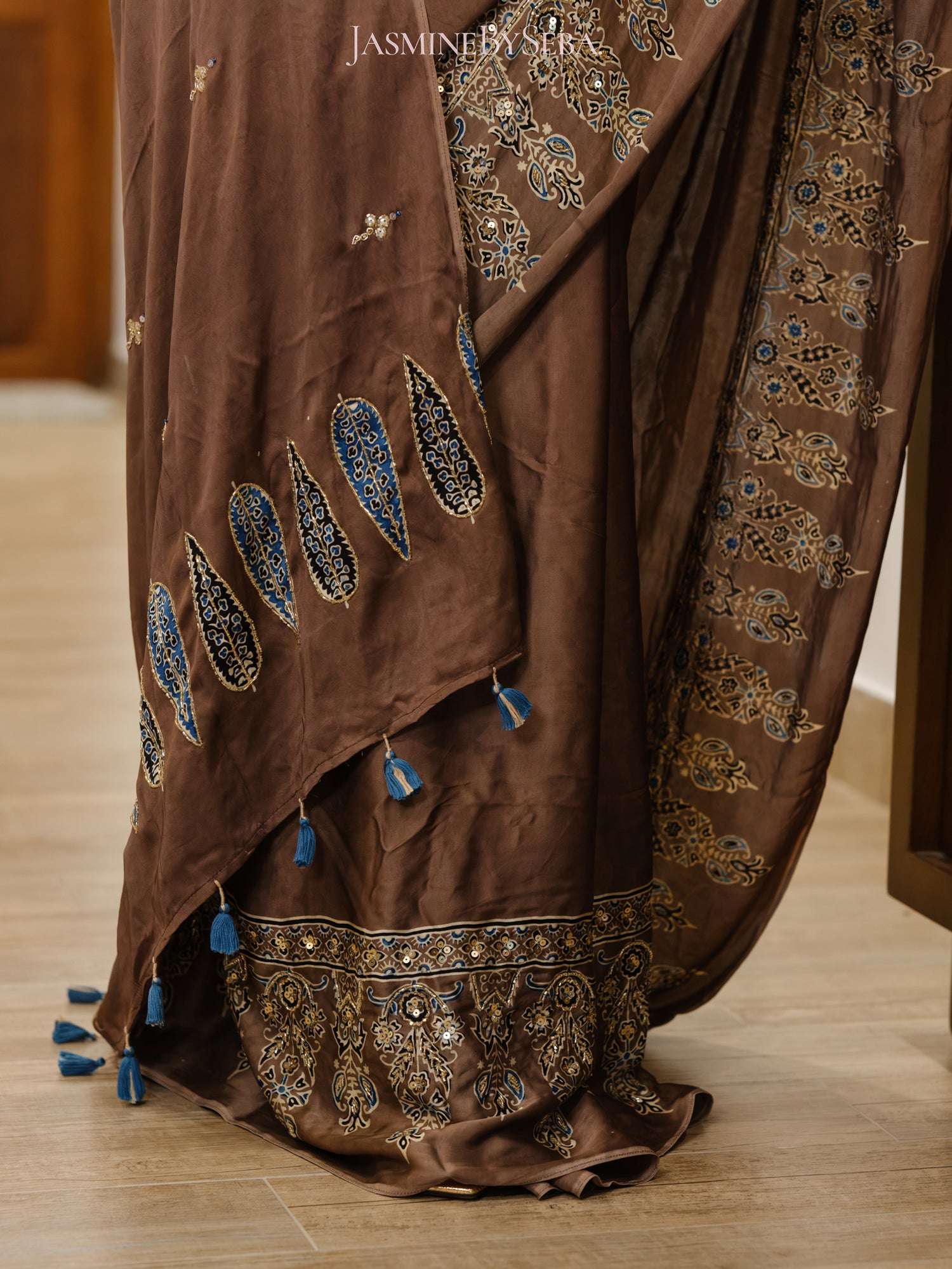 Bespoke ‘Jasmine’ hand printed 
Ajrakh pure modal silk hand dyed, hand block printed and handworked saree