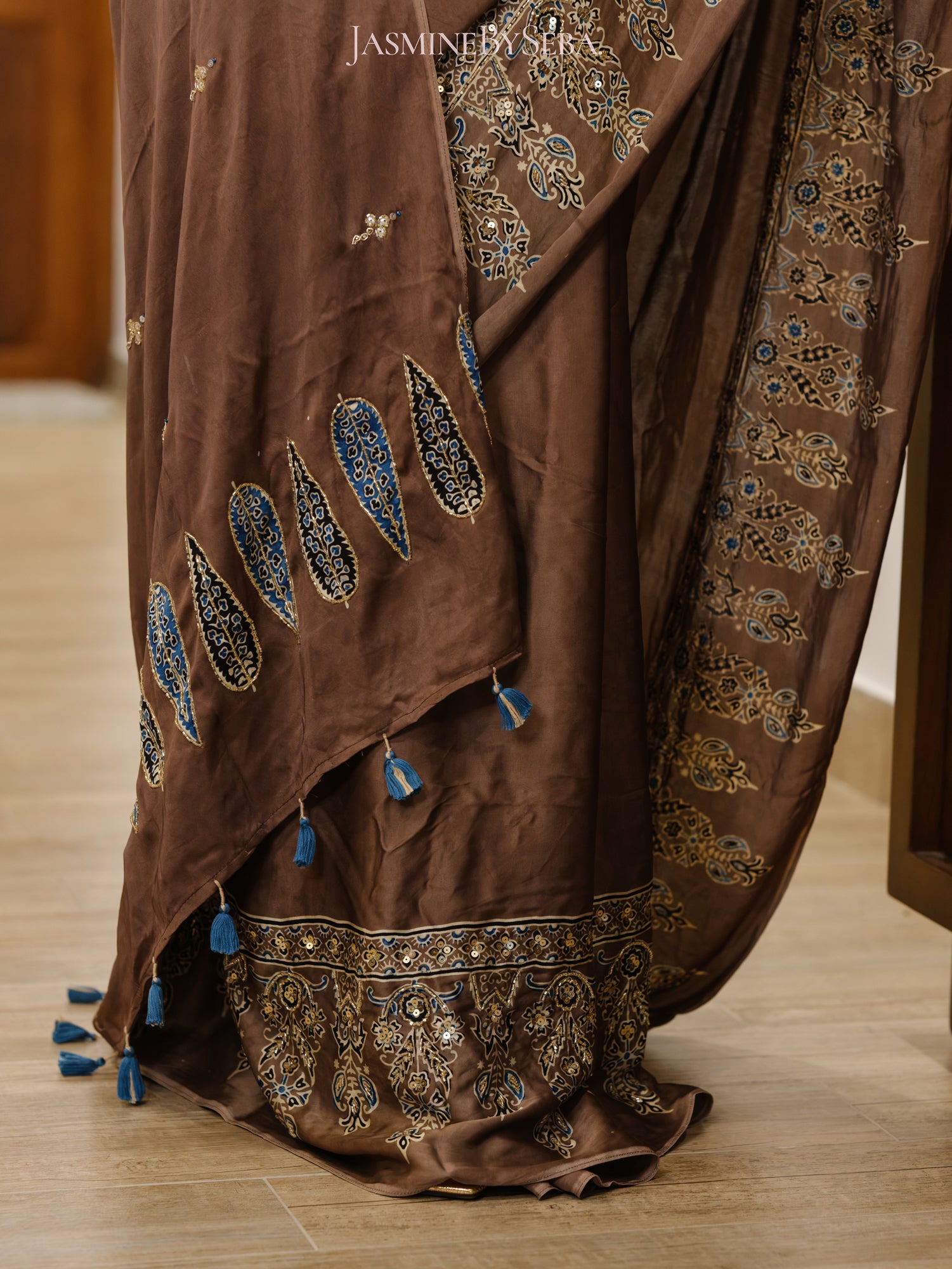Bespoke ‘Jasmine’ hand printed 
Ajrakh pure modal silk hand dyed, hand block printed and handworked saree
