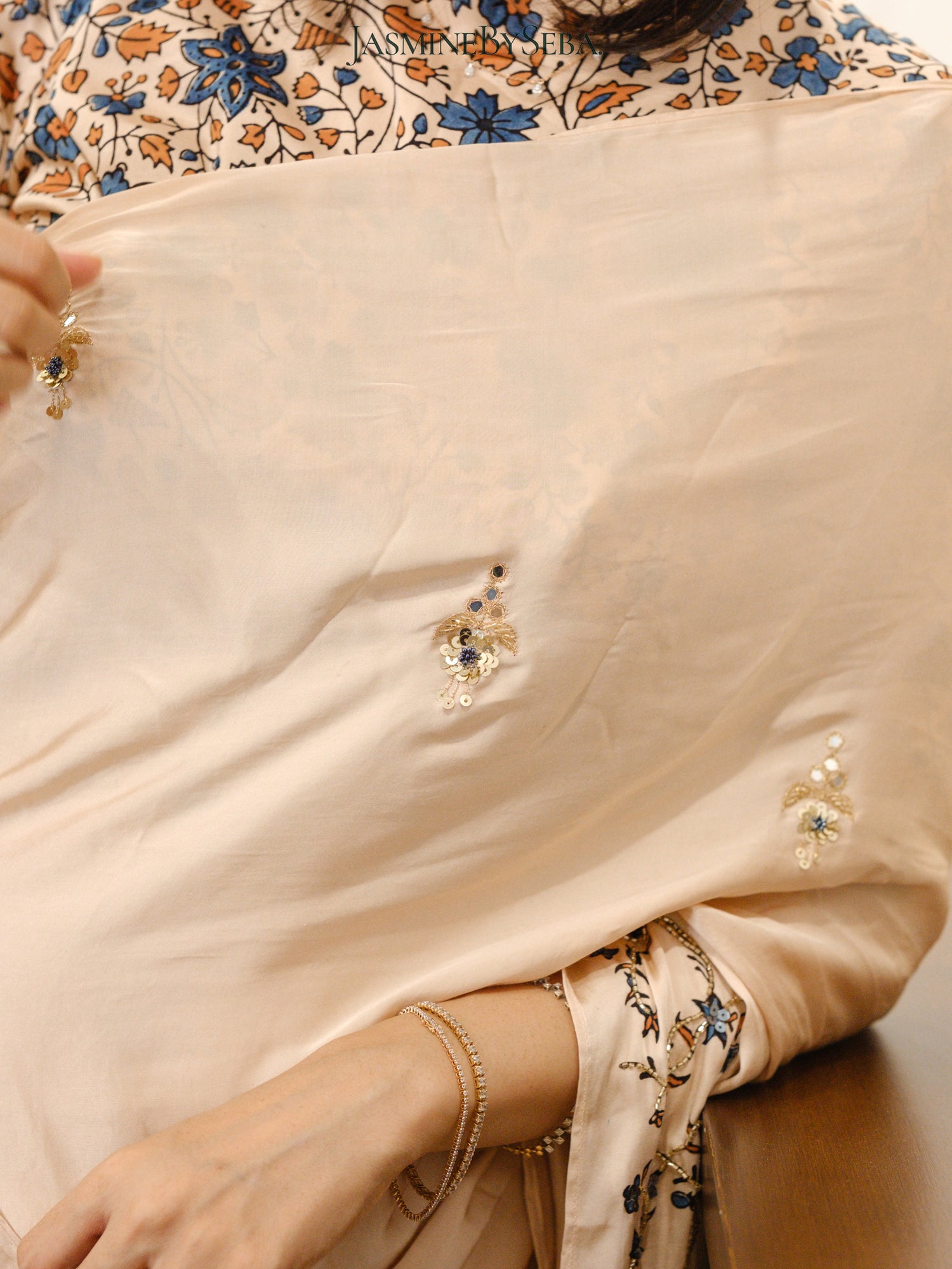 Bespoke ‘Jasmine’ hand printed 
Ajrakh pure modal silk hand dyed, hand block printed and handworked saree