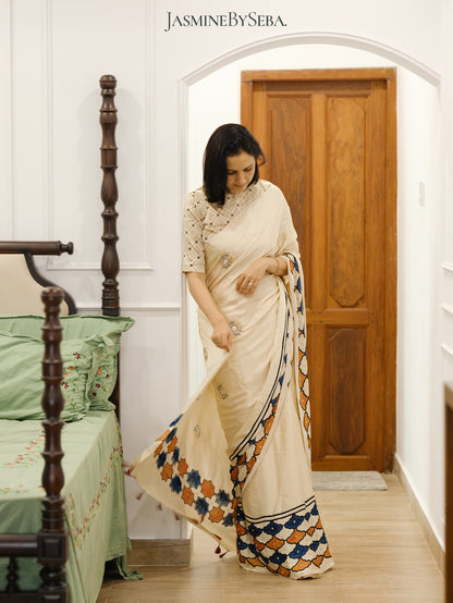 Bespoke ‘Jasmine’ hand printed 
Ajrakh pure modal silk hand dyed, hand block printed and handworked saree