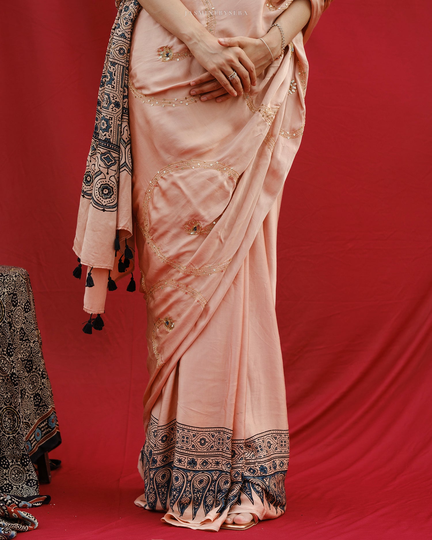 Ajrakh modal silk hand dyed, hand block printed and handworked saree