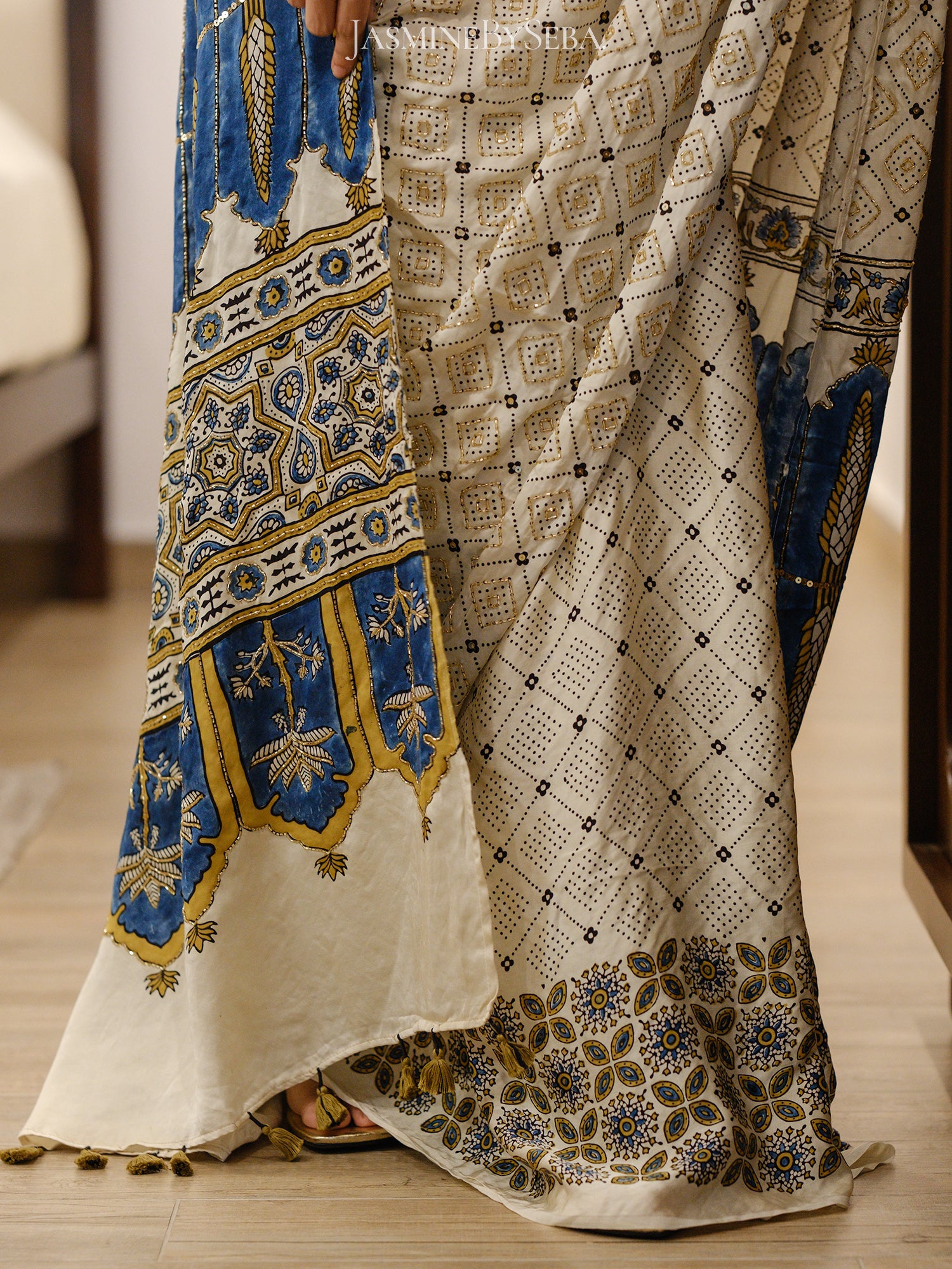Ajrakh pure modal silk hand dyed, hand block printed and handworked saree