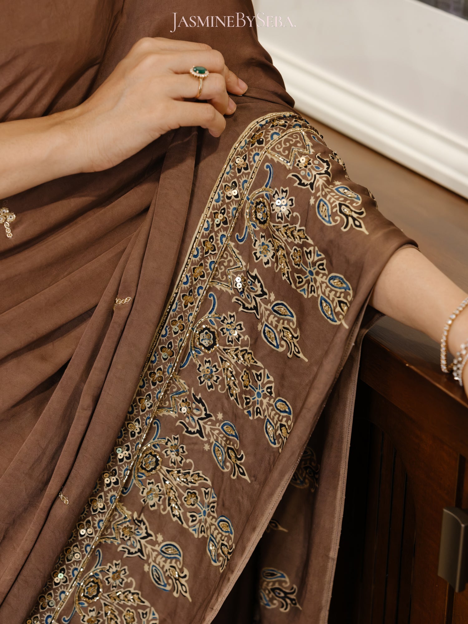 Bespoke ‘Jasmine’ hand printed 
Ajrakh pure modal silk hand dyed, hand block printed and handworked saree