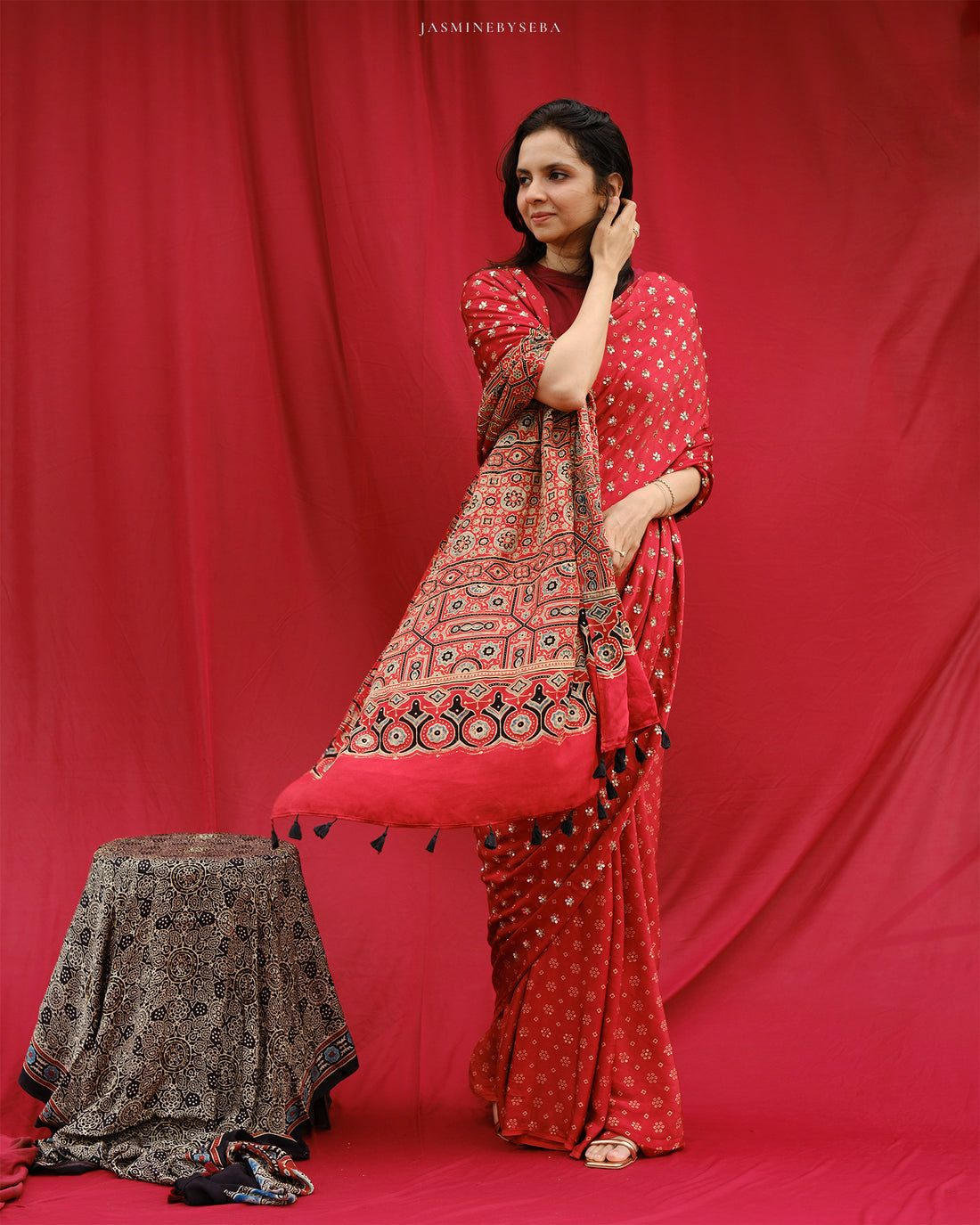 Ajrakh modal silk hand dyed, hand block printed and handworked saree