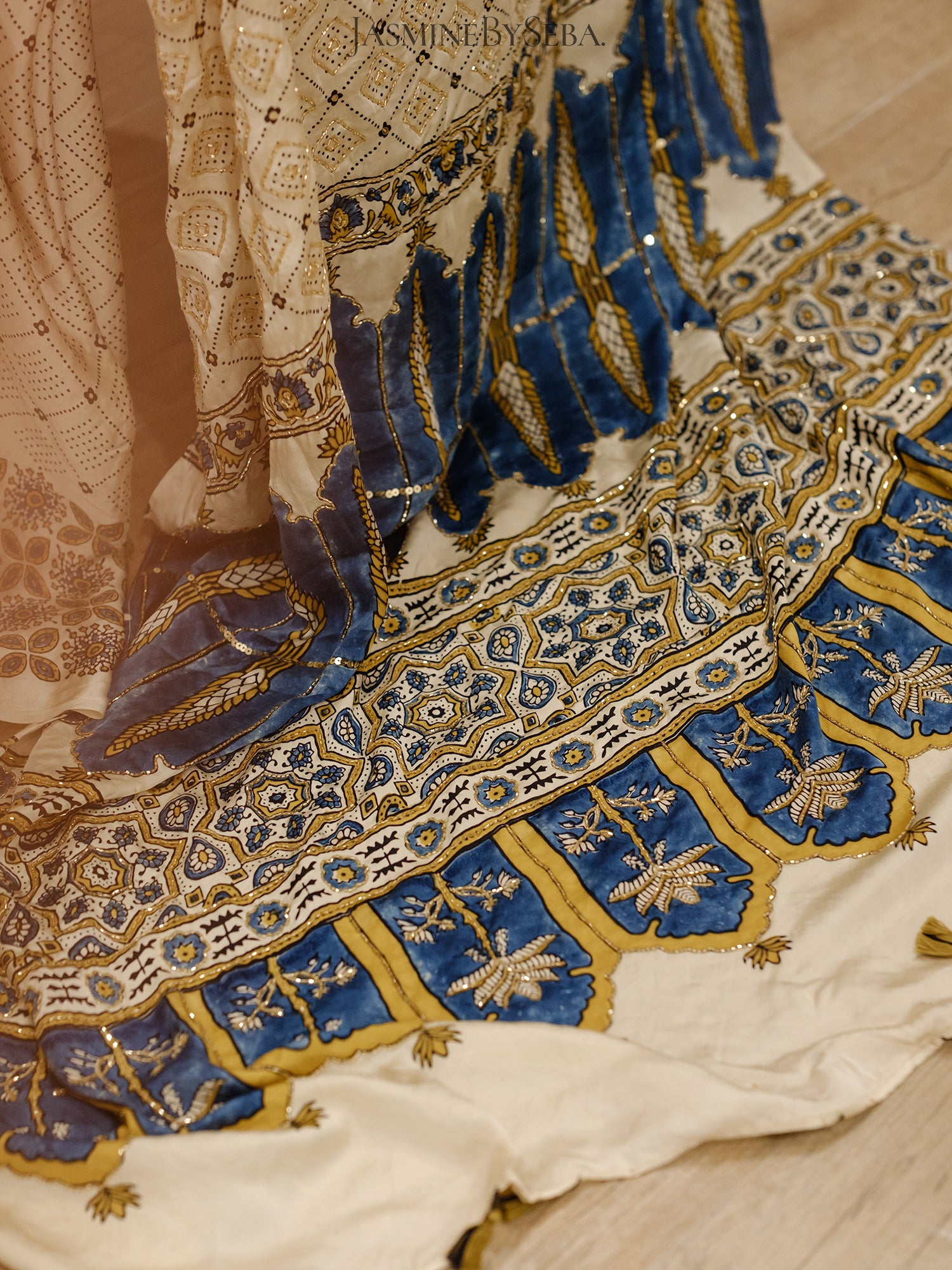 Ajrakh pure modal silk hand dyed, hand block printed and handworked saree