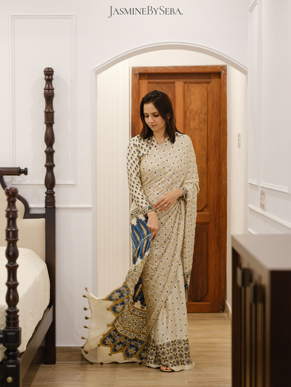 Ajrakh pure modal silk hand dyed, hand block printed and handworked saree