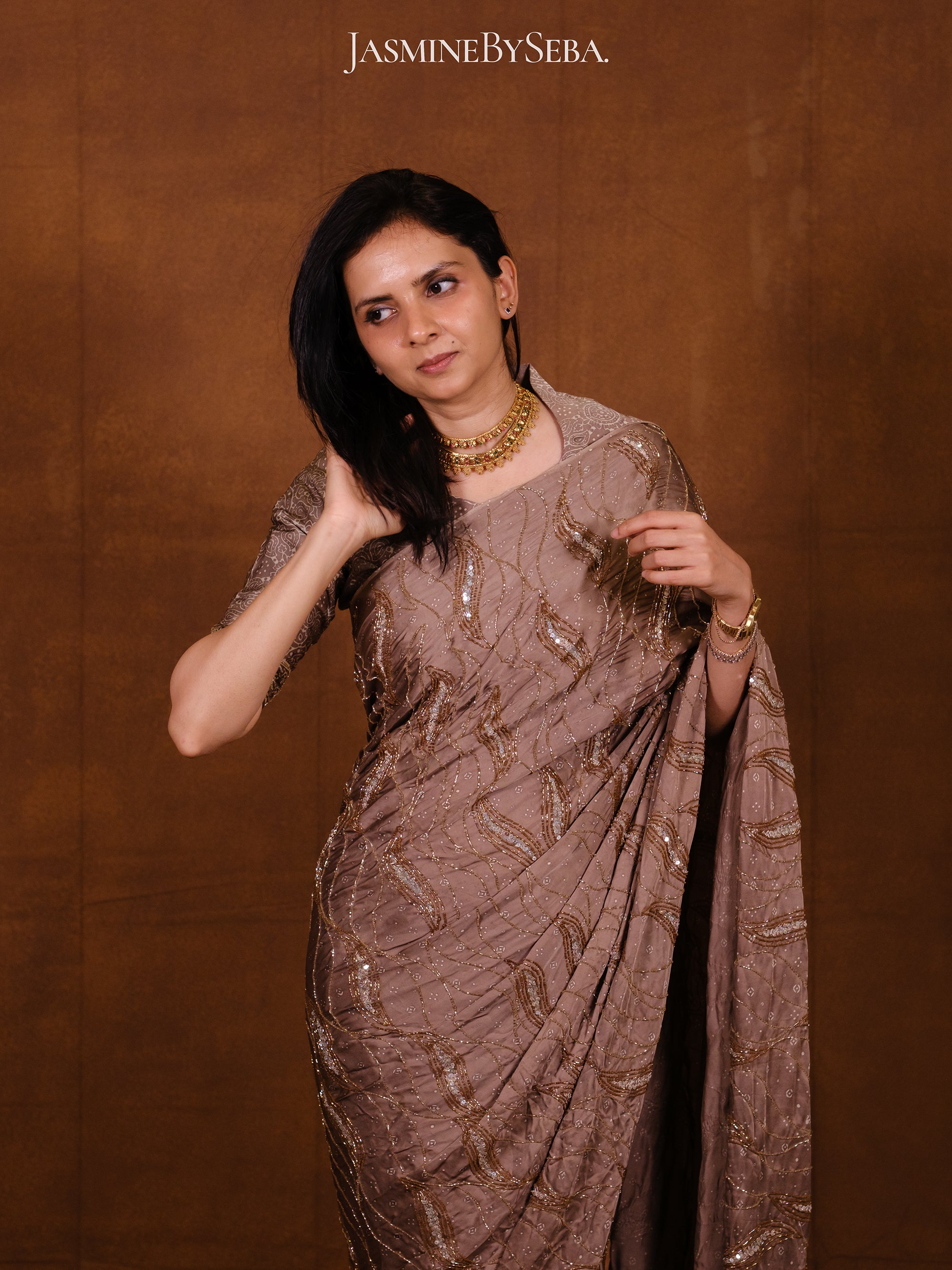 Ajrakh pure modal silk hand dyed, hand block printed and handworked saree