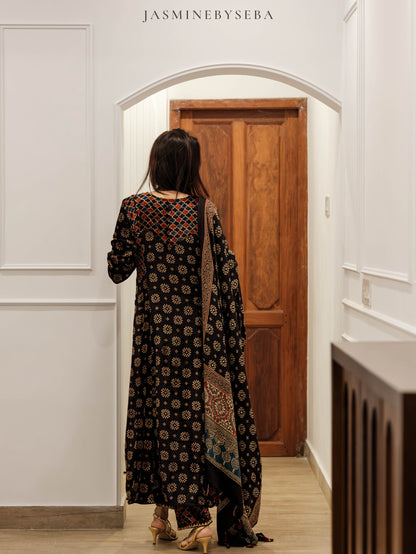 Ajrakh hand dyed hand block printed velvet silk panel cut salwar set with hand embroidry