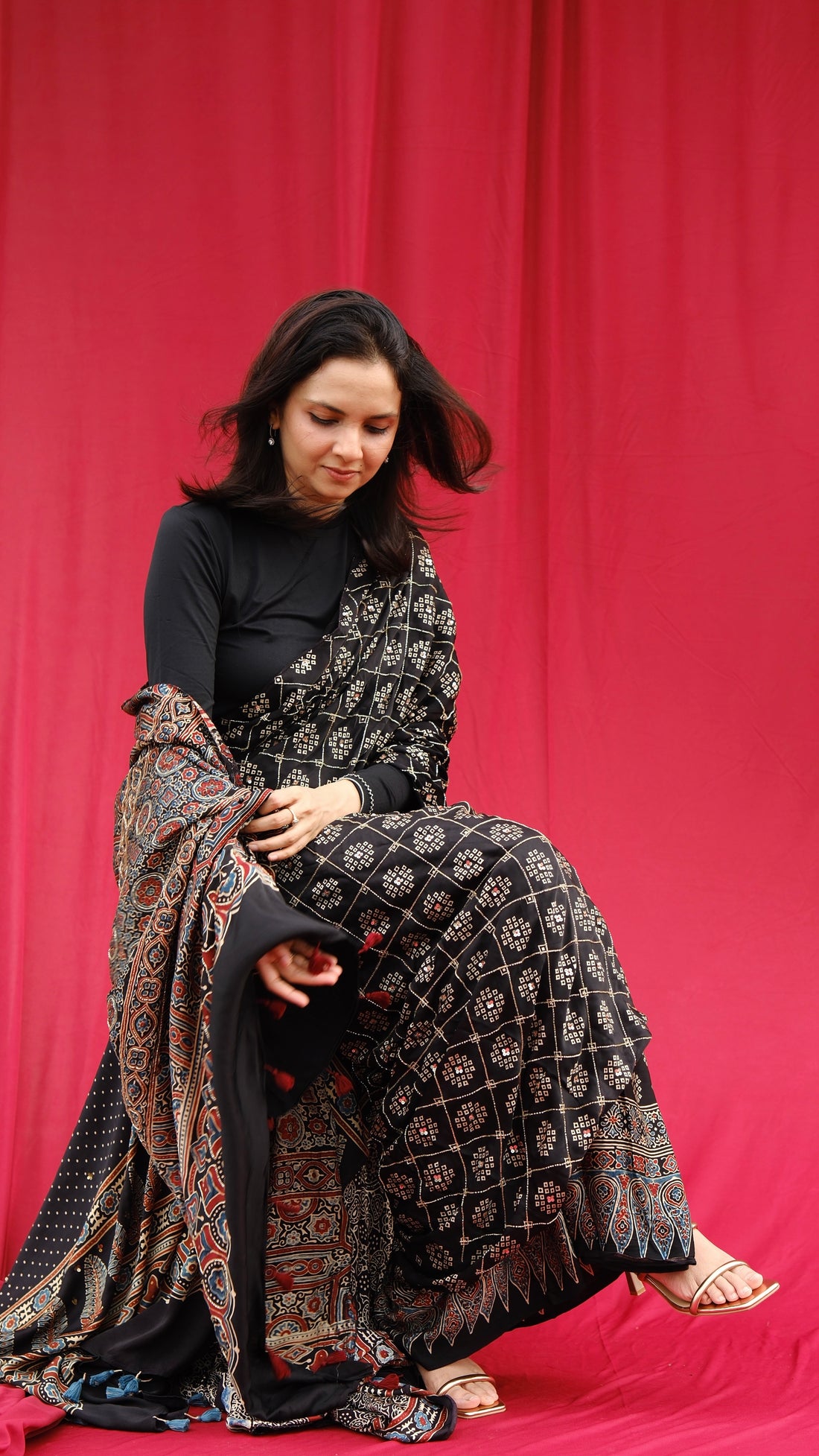 Ajrakh modal silk hand dyed, hand block printed and handworked saree