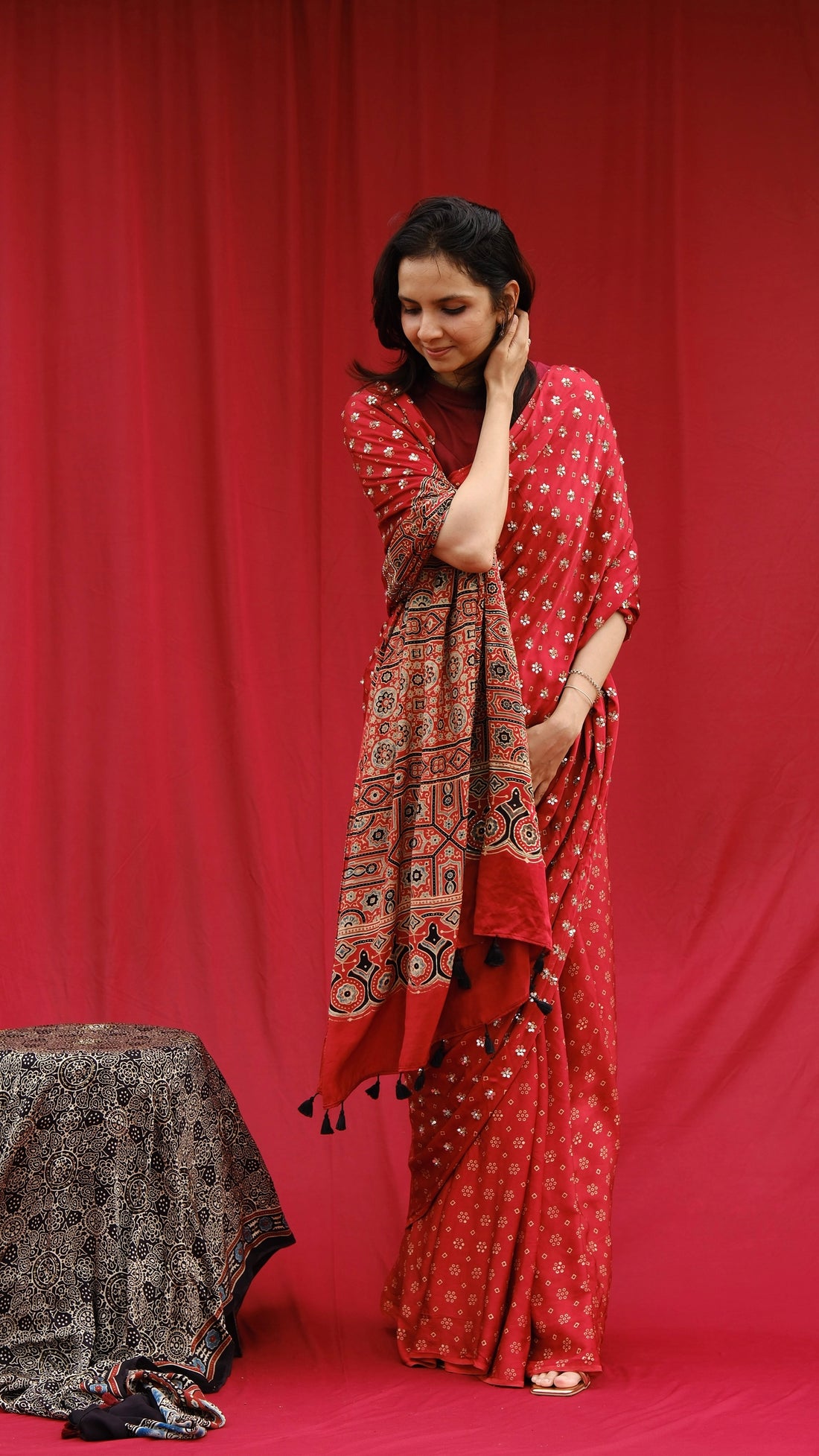 Ajrakh modal silk hand dyed, hand block printed and handworked saree