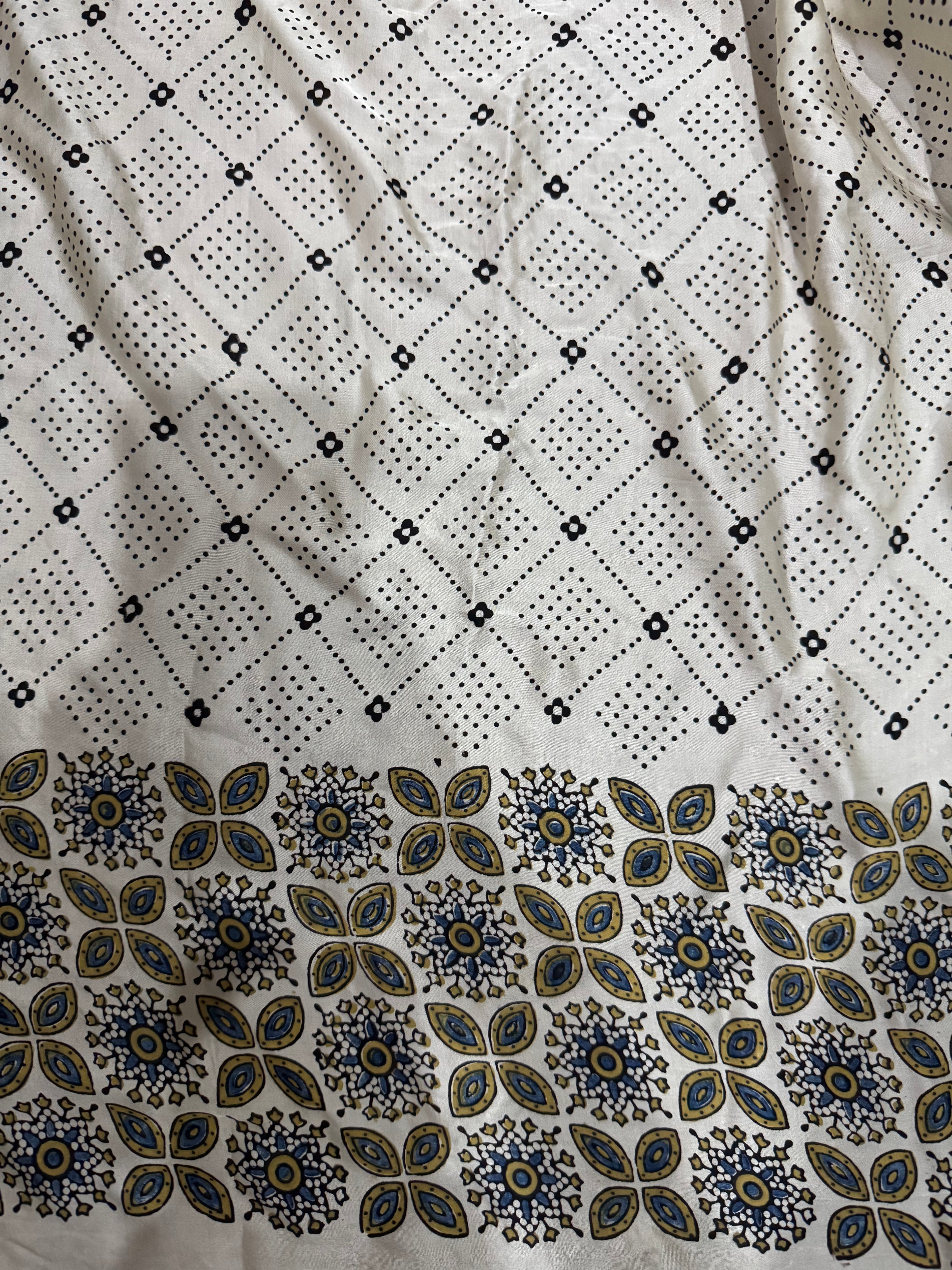 Ajrakh pure modal silk hand dyed, hand block printed and handworked saree