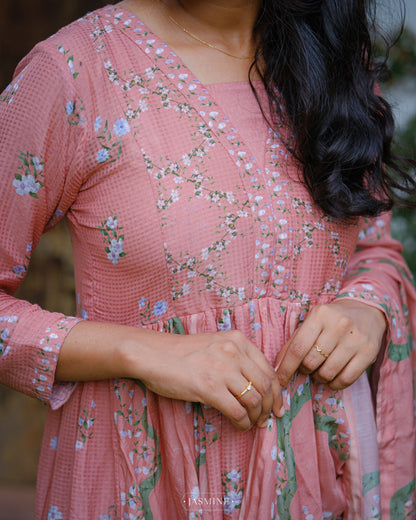 In-house printed Jasmine prints on coral shaded pleated kurta set in viscose voile